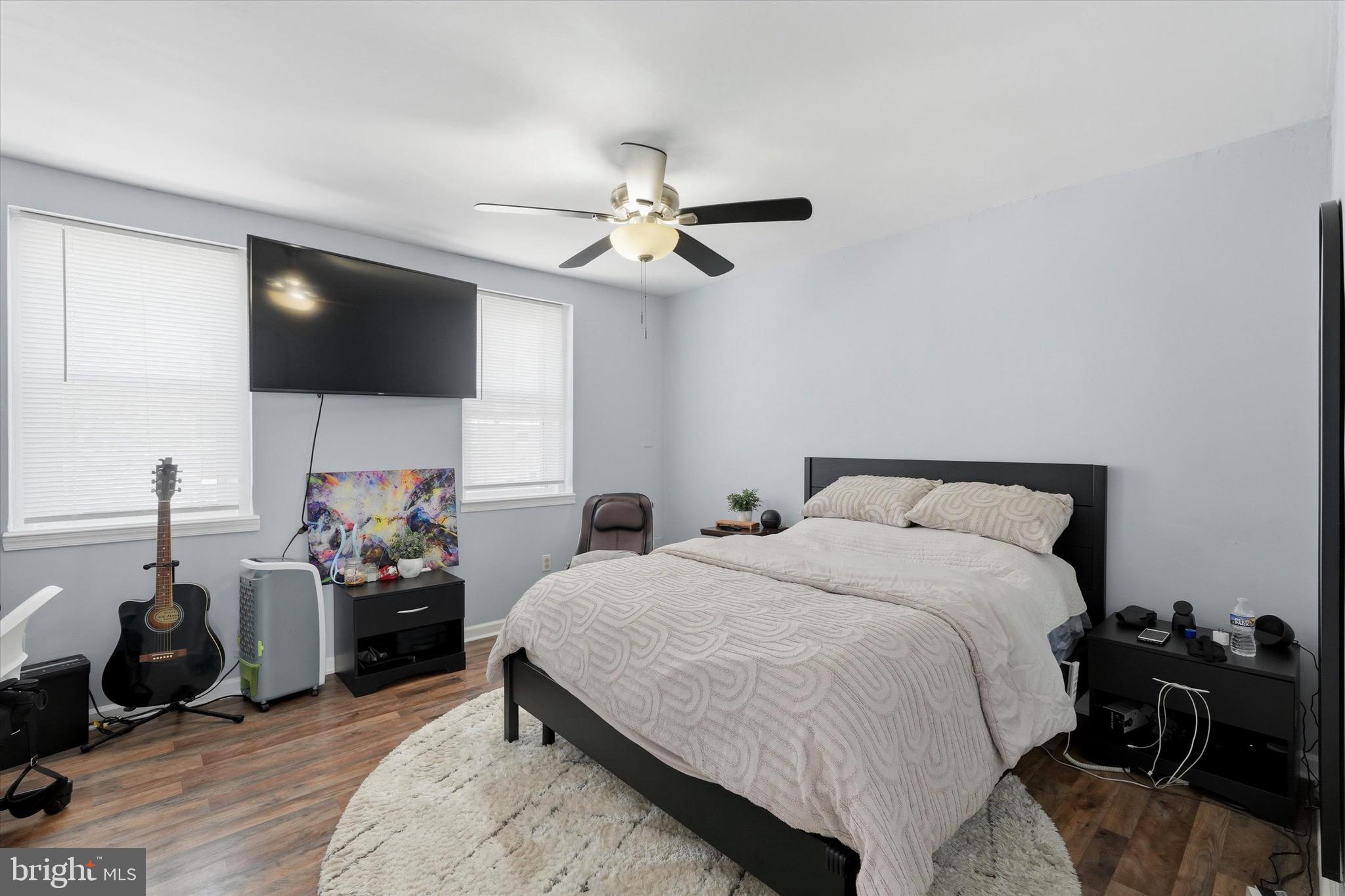 4604 Meridian Street Philadelphia, PA 19136 - Photo 7 of 15 a bedroom with a bed and a flat screen tv