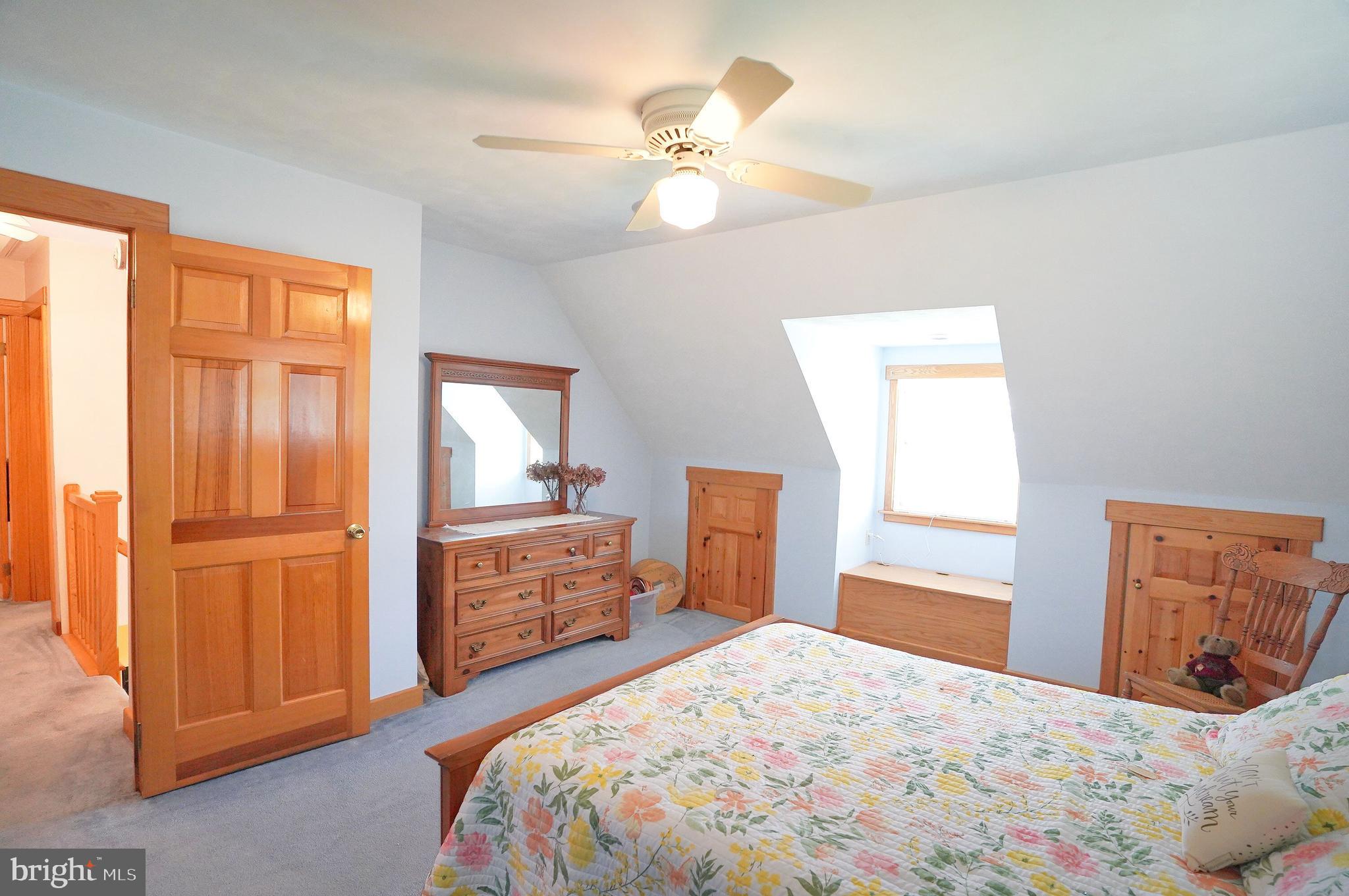245 Montclair Road Gettysburg, PA 17325 - Photo 21 of 32 a bedroom with a bed dresser and a window