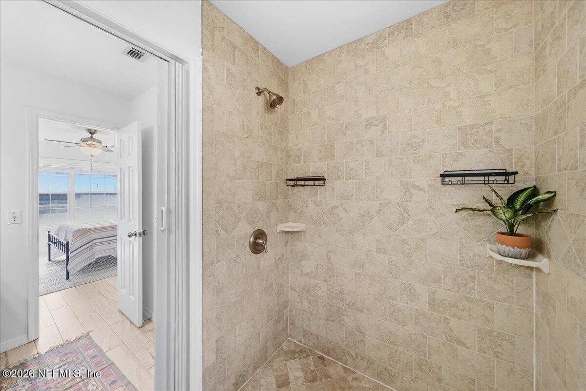 425 3rd Street West Baldwin, FL 32234 - Photo 22 of 47 a bathroom with a shower