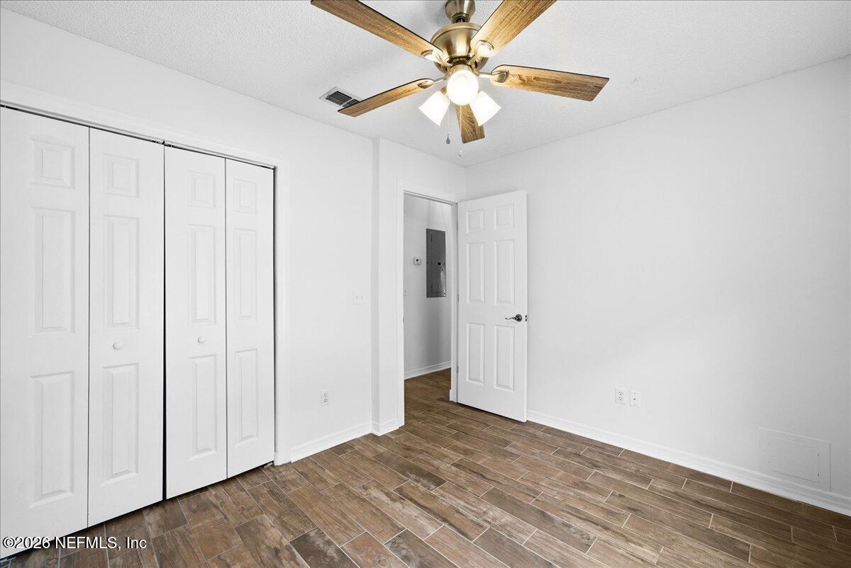 425 3rd Street West Baldwin, FL 32234 - Photo 24 of 47 wooden floor in an empty room