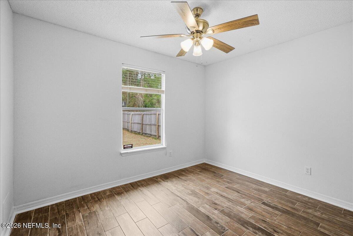 425 3rd Street West Baldwin, FL 32234 - Photo 25 of 47 an empty room with a window