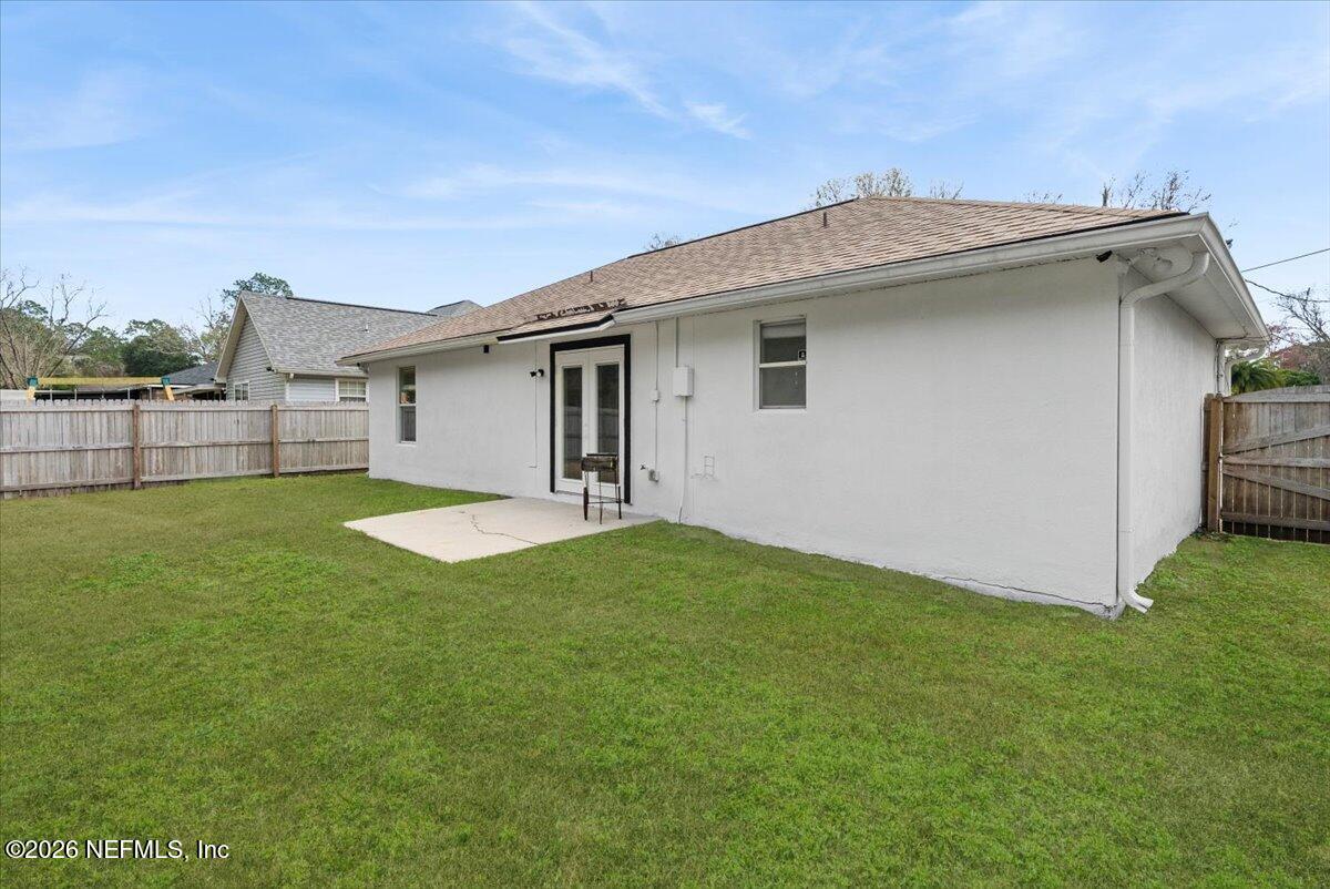425 3rd Street West Baldwin, FL 32234 - Photo 33 of 47 a view of a house with a backyard