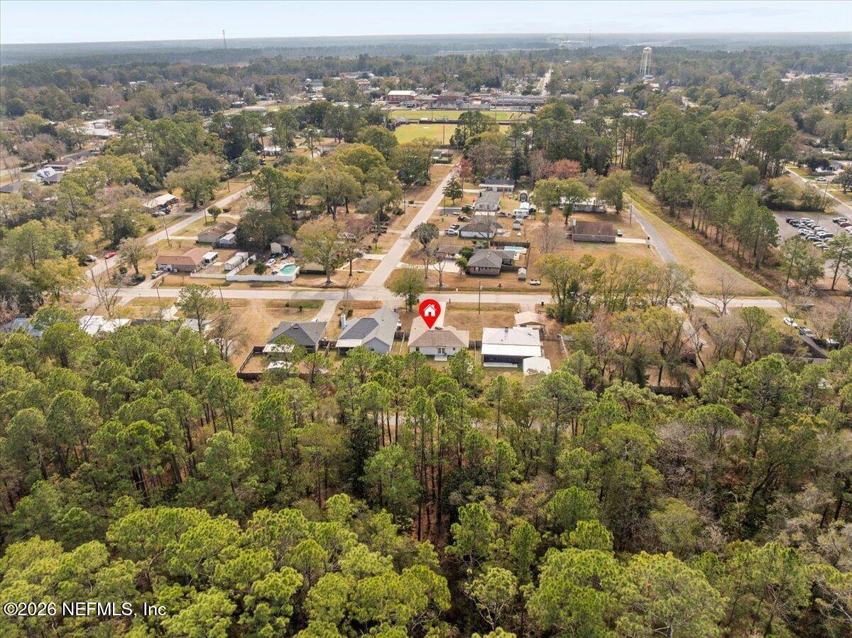 425 3rd Street West Baldwin, FL 32234 - Photo 45 of 47 an aerial view of residential house with parking and city view