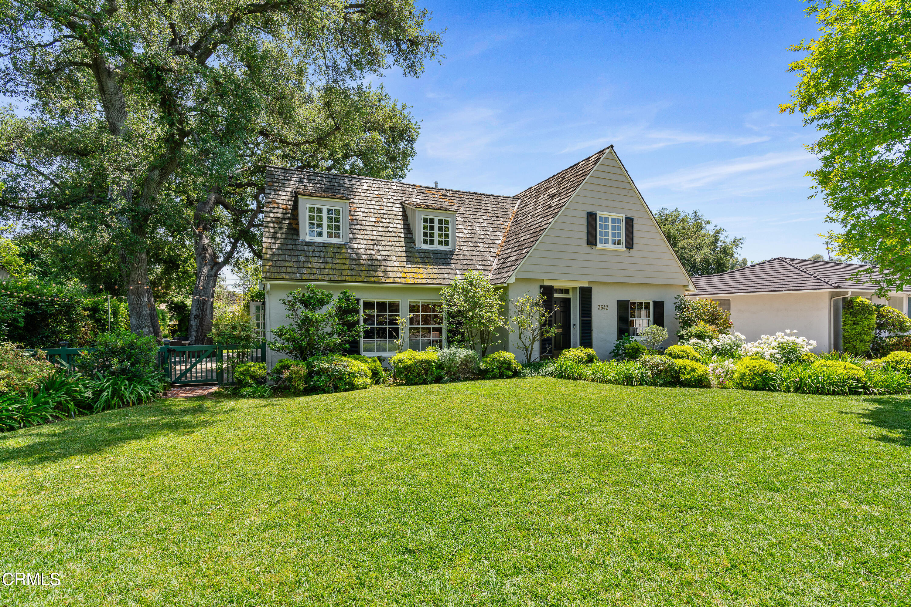 3642 Yorkshire Road Pasadena, CA 91107 - Photo 1 of 37 a front view of a house with a yard and garage