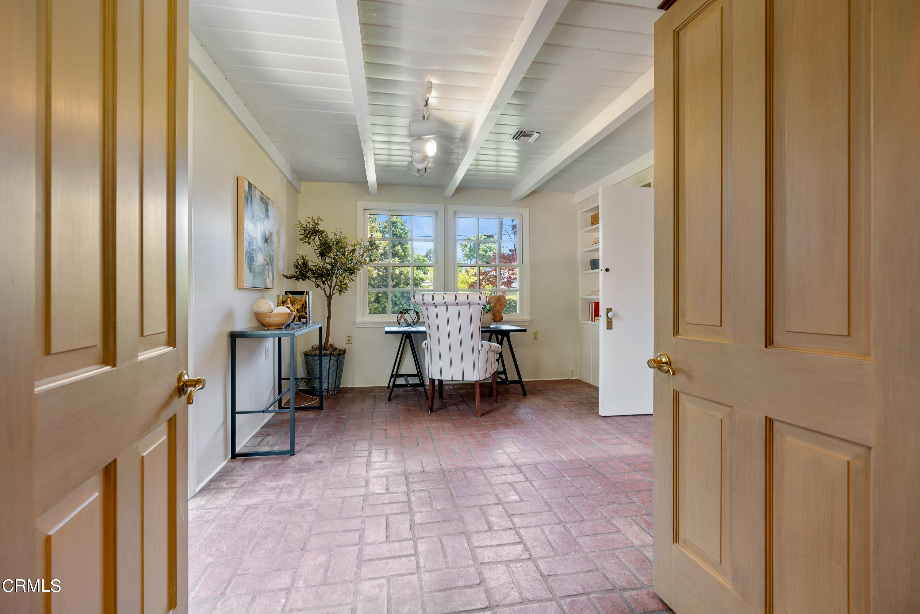 3642 Yorkshire Road Pasadena, CA 91107 - Photo 12 of 37 a view of a hallway with dining area and chandelier