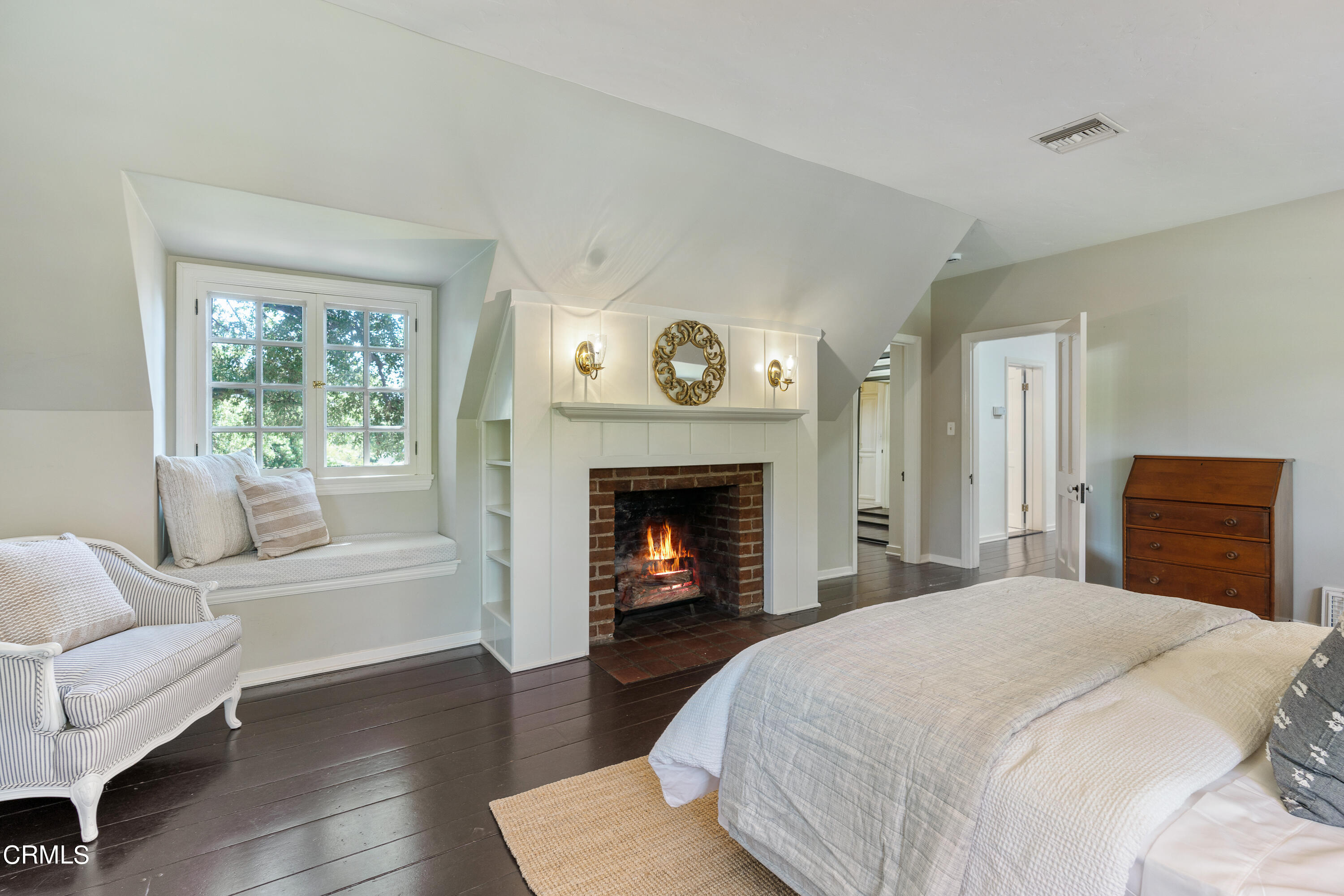 3642 Yorkshire Road Pasadena, CA 91107 - Photo 23 of 37 a bedroom with a bed and a fireplace