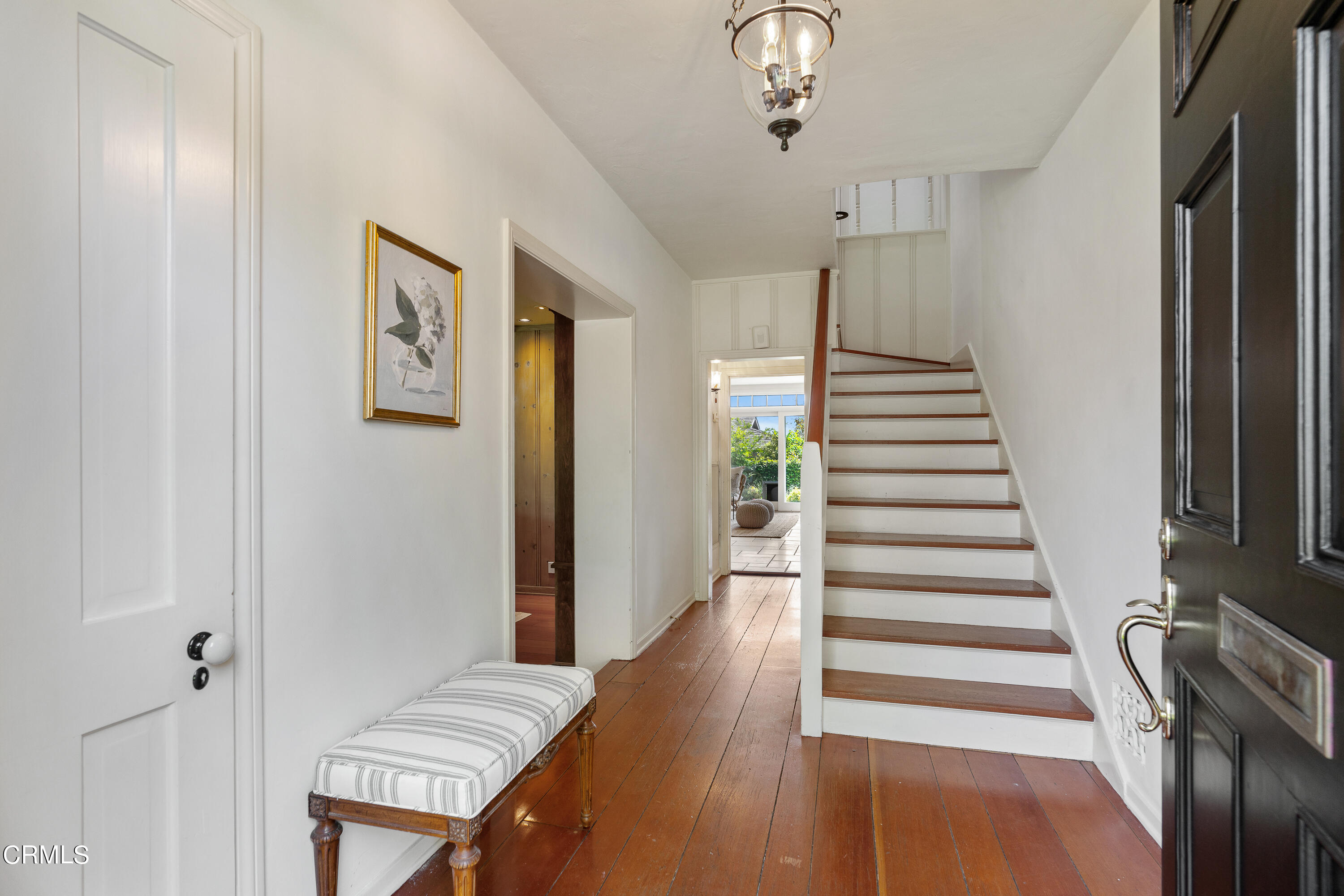 3642 Yorkshire Road Pasadena, CA 91107 - Photo 7 of 37 a view of a hallway with wooden floor and staircase