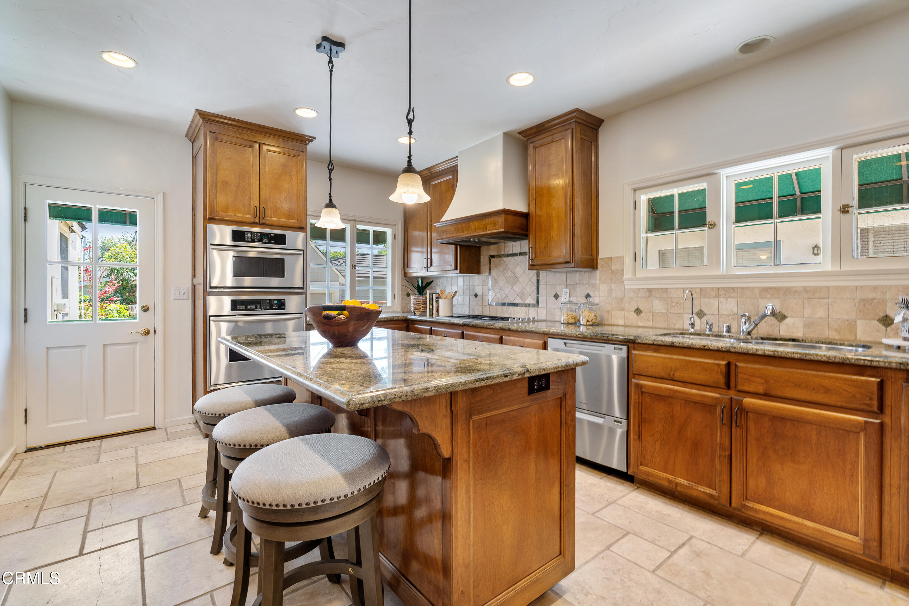 3642 Yorkshire Road Pasadena, CA 91107 - Photo 9 of 37 a kitchen with granite countertop lots of counter top space and appliances