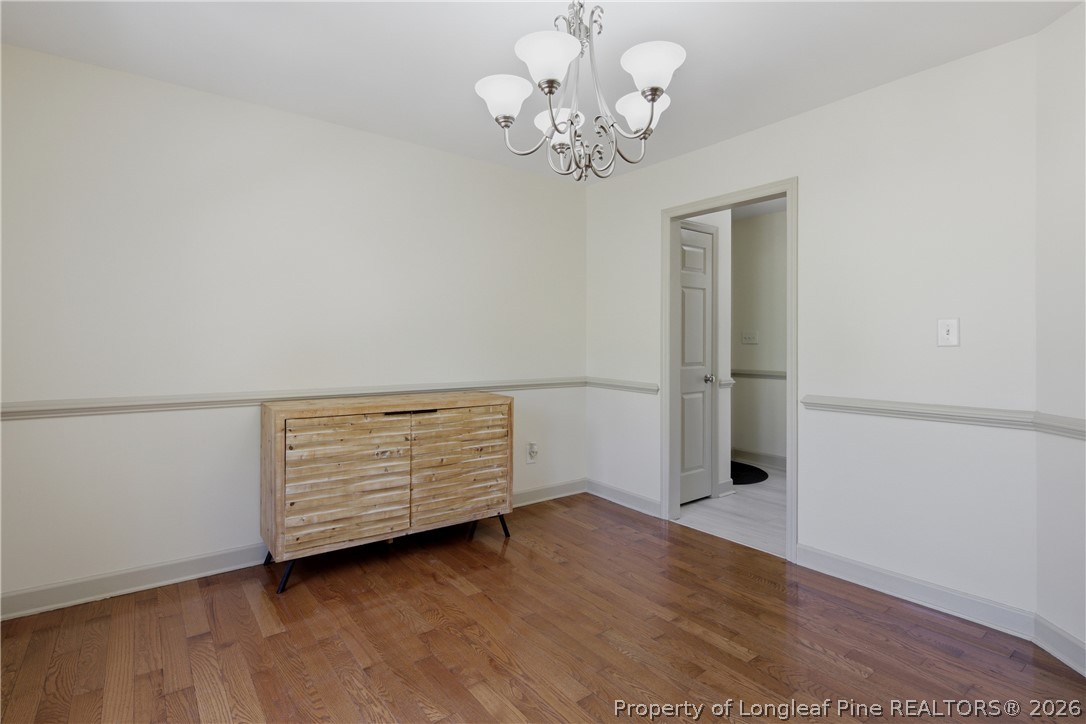 1075 Buffalo Lake Road Sanford, NC 27332 - Photo 6 of 49 wooden floor in an empty room