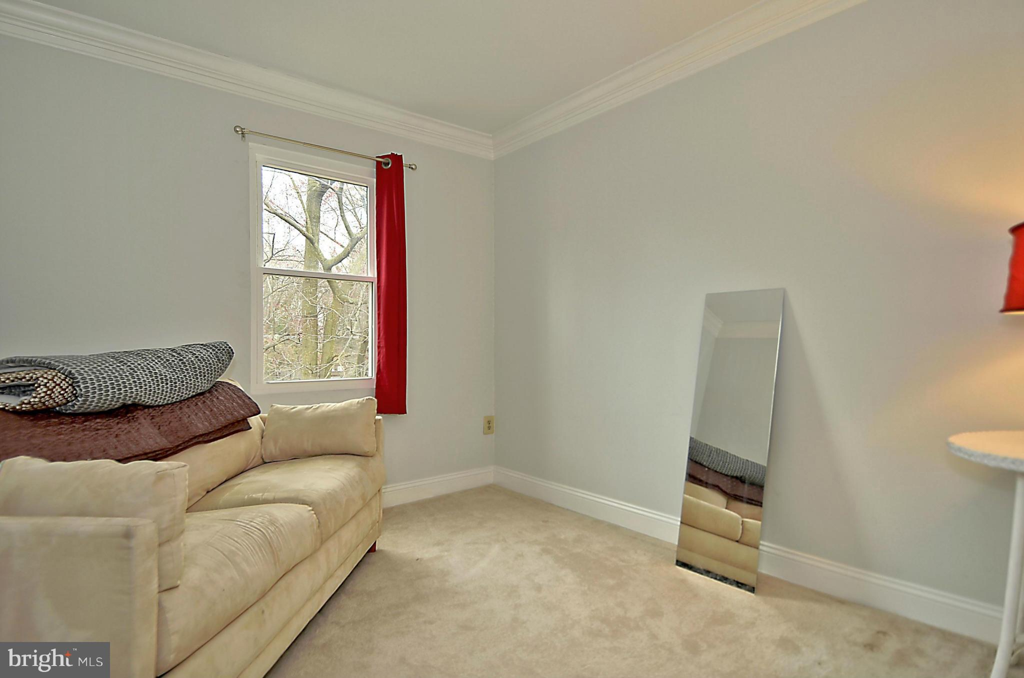 35 Kinsman View Circle Silver Spring, MD 20901 - Photo 12 of 30 a living room with furniture and a window