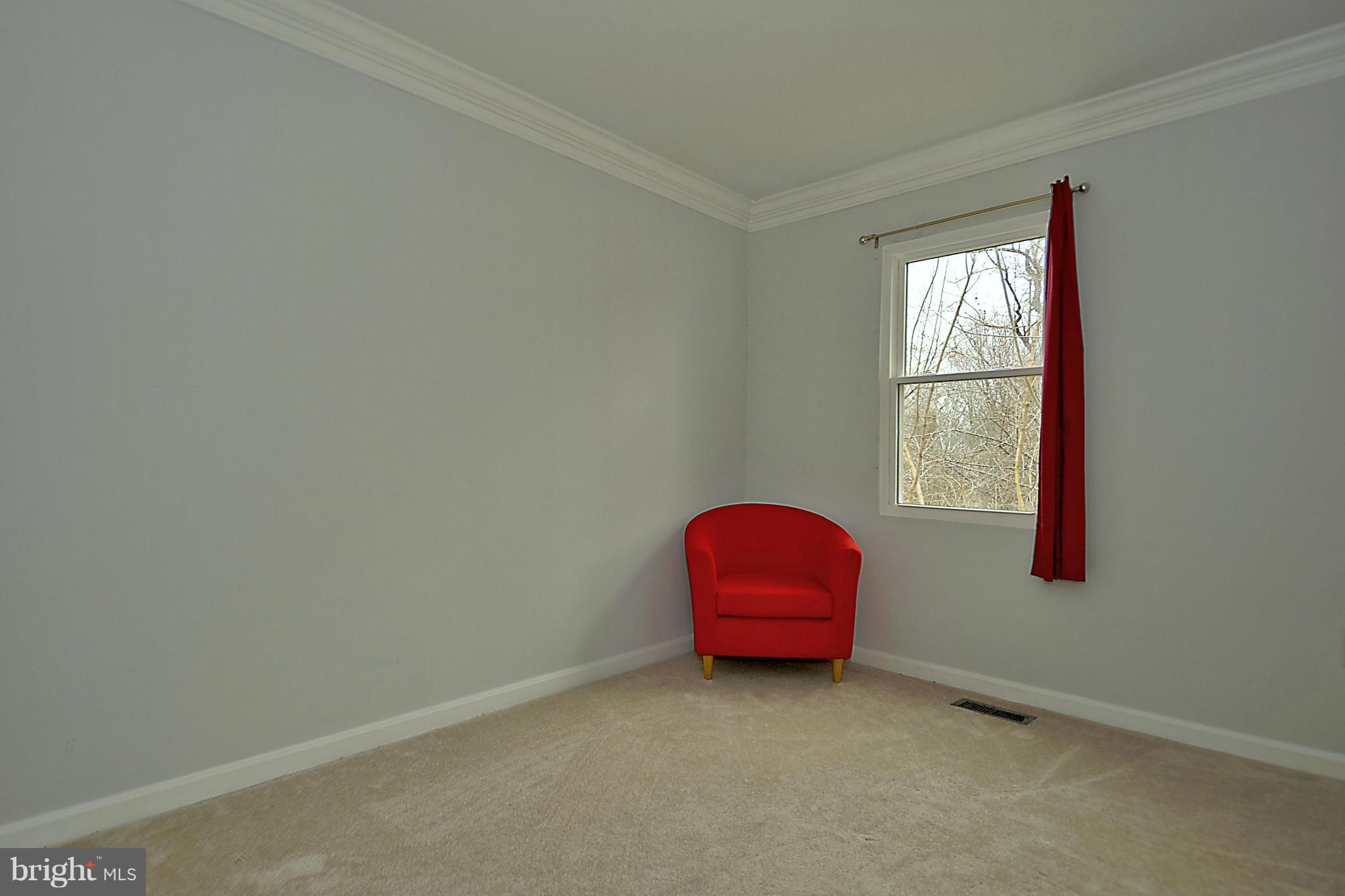 35 Kinsman View Circle Silver Spring, MD 20901 - Photo 14 of 30 a room with window and a table