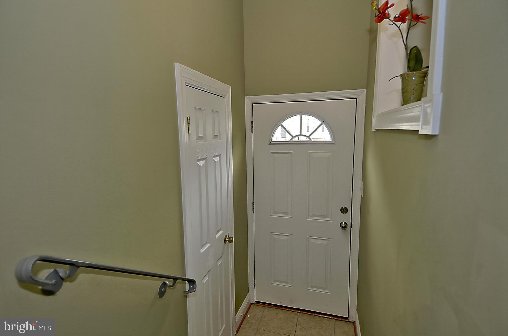 35 Kinsman View Circle Silver Spring, MD 20901 - Photo 18 of 30 a view of an entryway with wooden floor