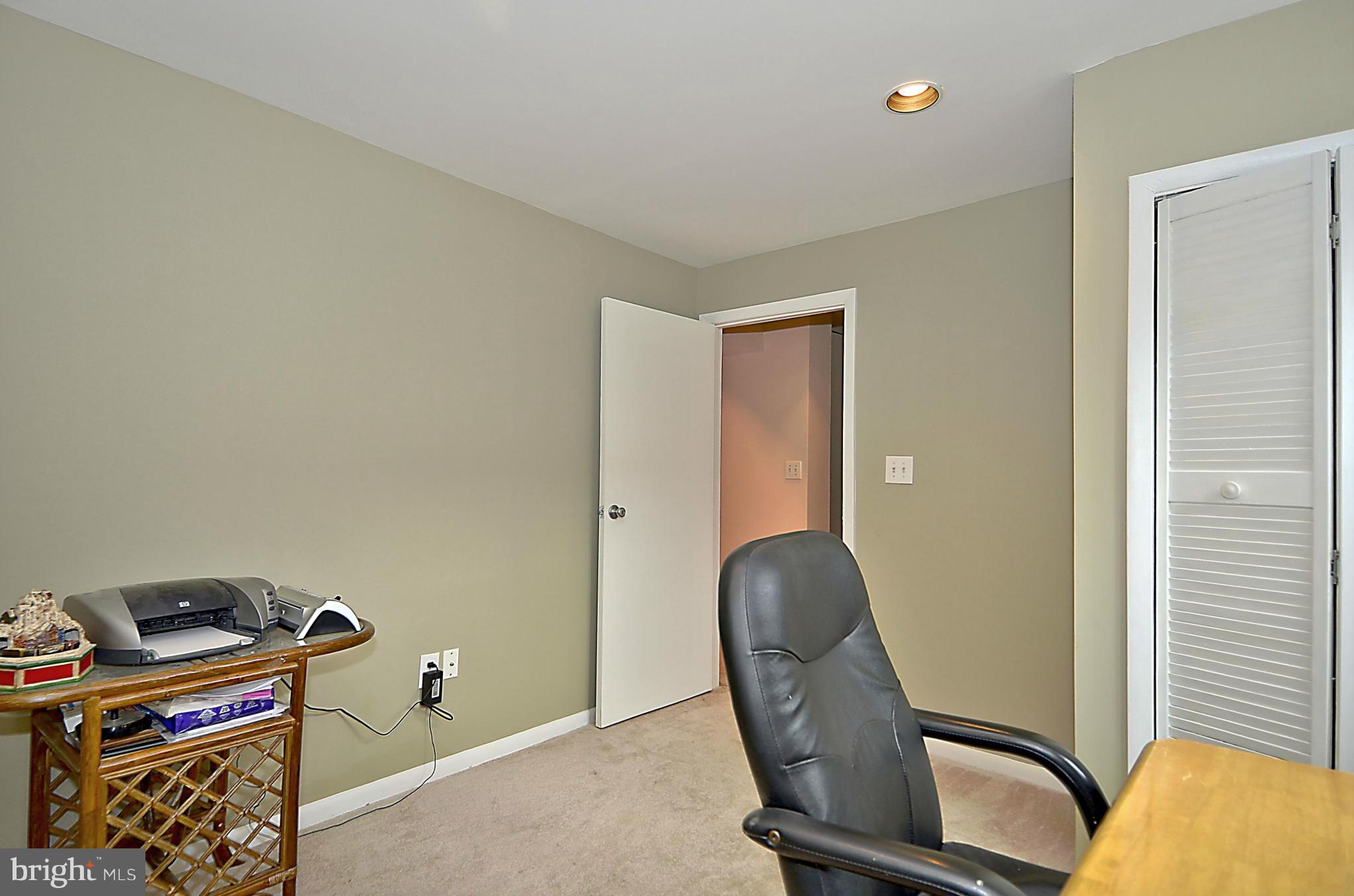 35 Kinsman View Circle Silver Spring, MD 20901 - Photo 22 of 30 a room with a chair and gym equipment