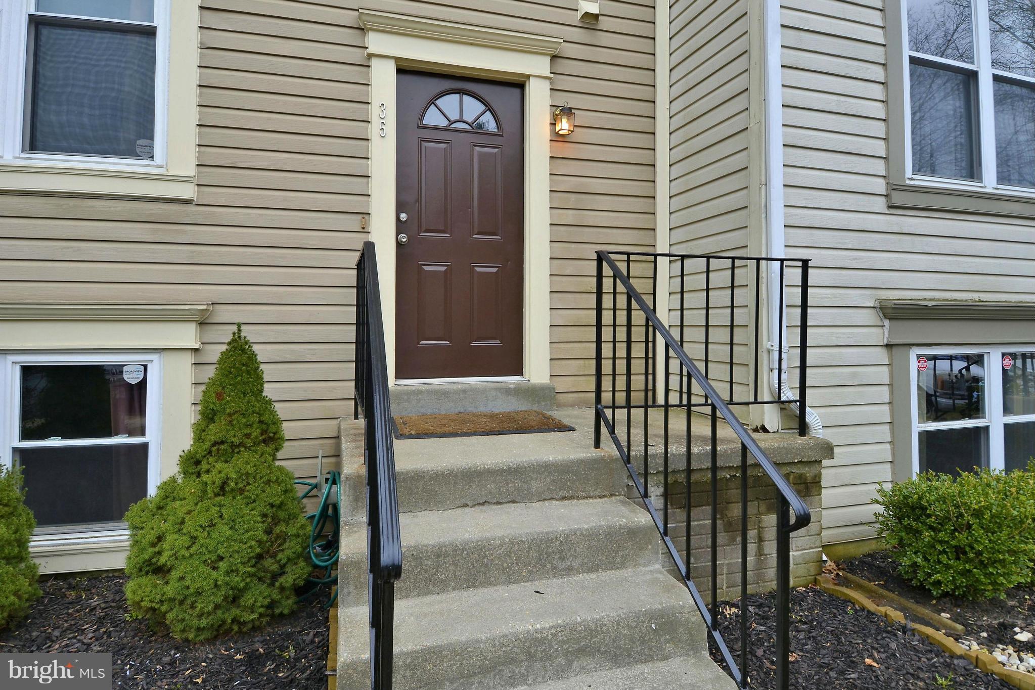 35 Kinsman View Circle Silver Spring, MD 20901 - Photo 30 of 30 a view of a brick house with a large windows