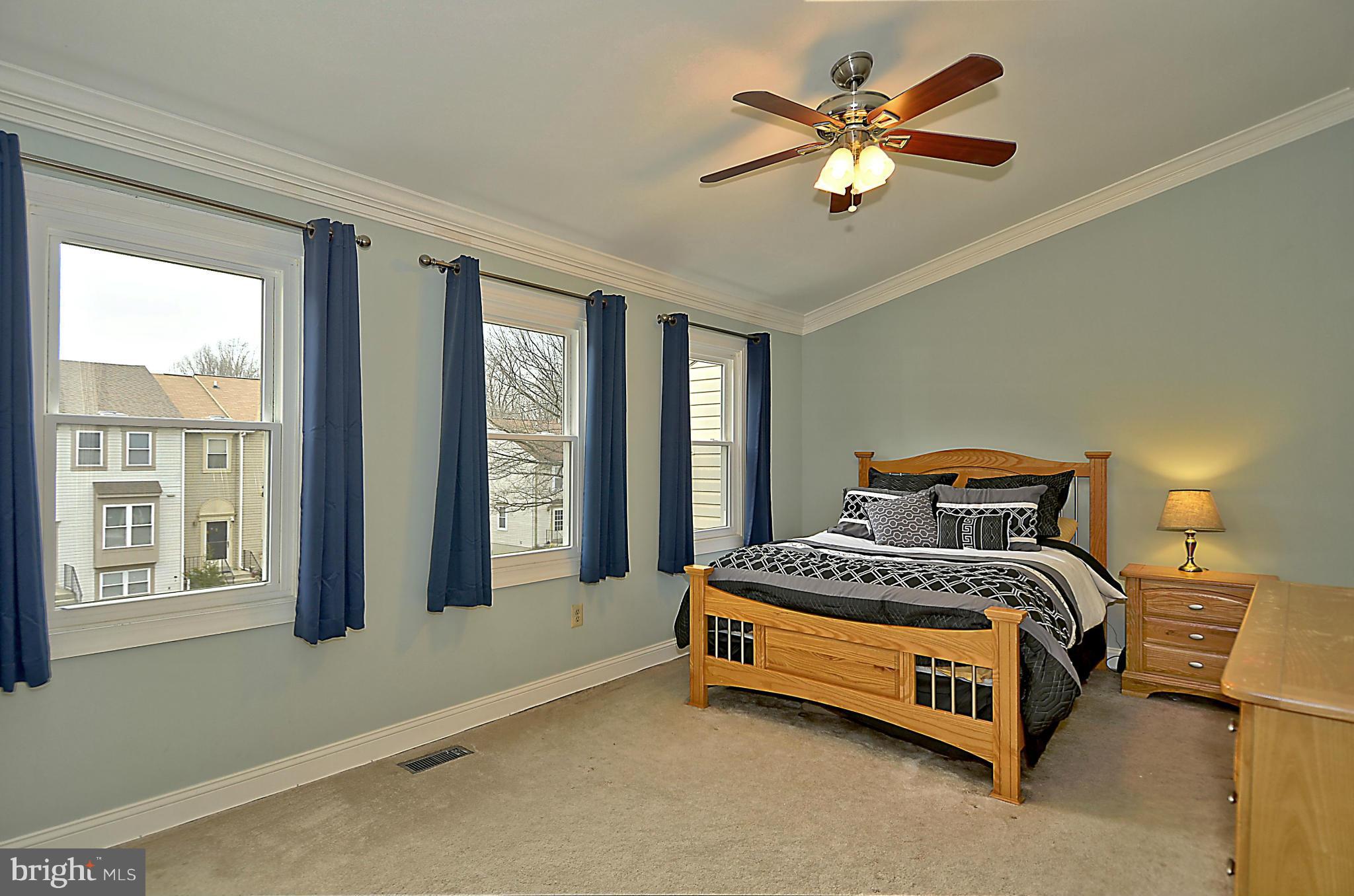 35 Kinsman View Circle Silver Spring, MD 20901 - Photo 10 of 30 a bedroom with a bed and window