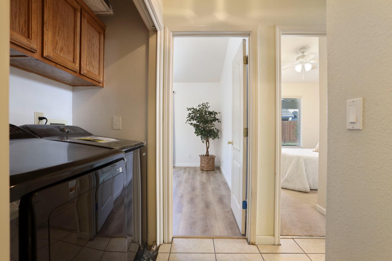 1505 Dreyfus Lane Modesto, CA 95355 - Photo 15 of 25 a kitchen with a sink and cabinets