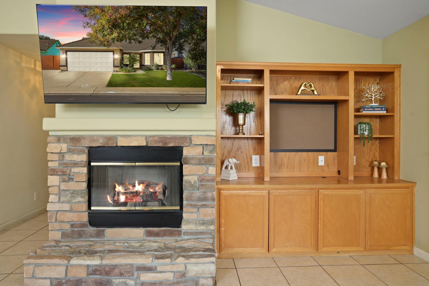 1505 Dreyfus Lane Modesto, CA 95355 - Photo 7 of 25 a kitchen with a fireplace and a counter top space