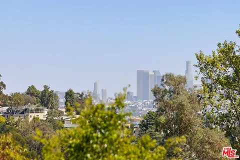 a view of a city with tall buildings