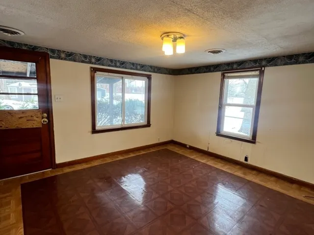 an empty room with windows