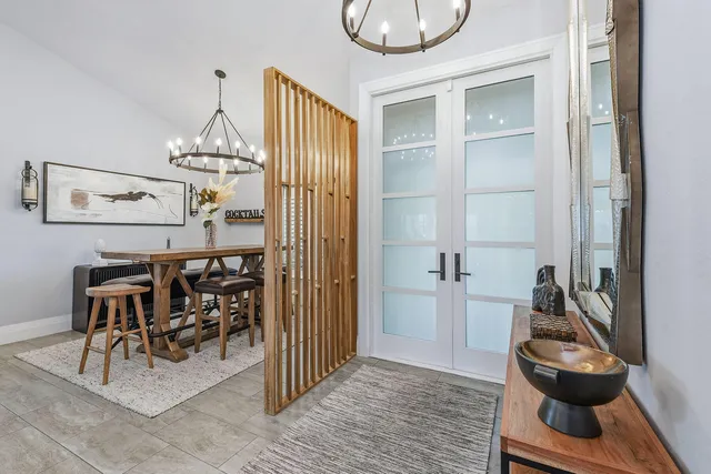 a view of a livingroom with furniture and wooden floor