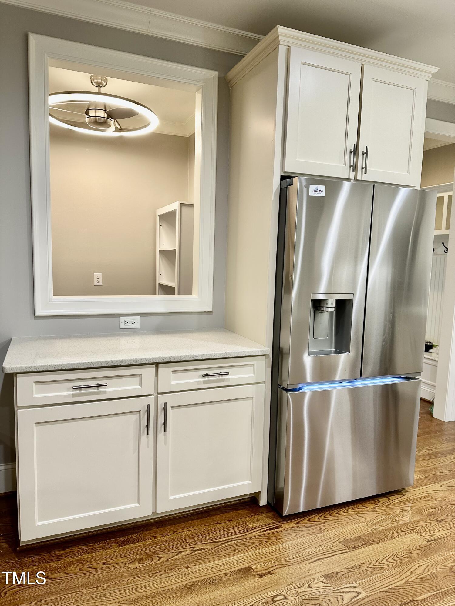 129 Cofield Circle Durham, NC 27707 - Photo 12 of 37 a close view of a refrigerator in kitchen and wooden floor