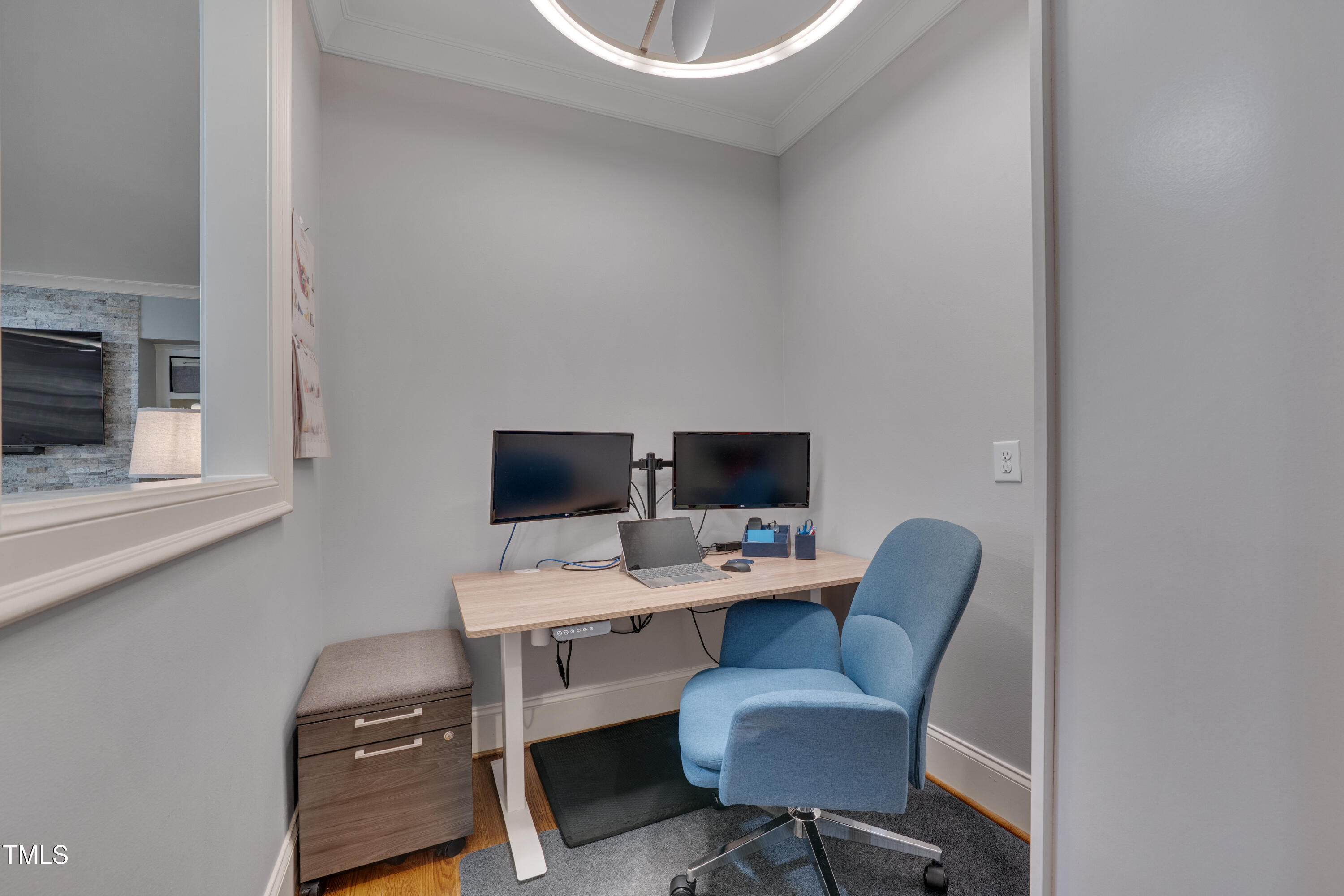129 Cofield Circle Durham, NC 27707 - Photo 13 of 37 a work room with furniture and a flat screen tv