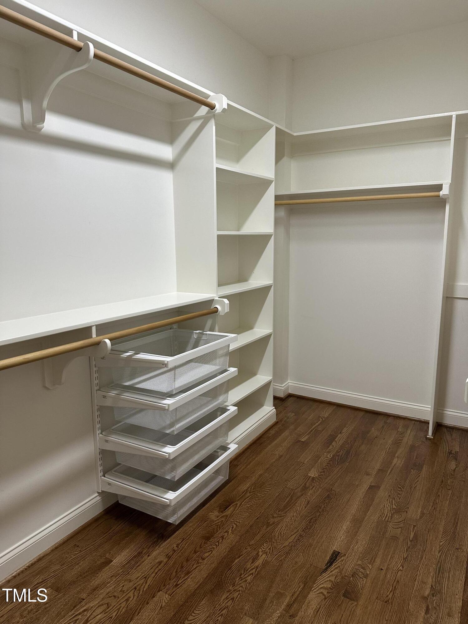 129 Cofield Circle Durham, NC 27707 - Photo 18 of 37 a view of an empty room with wooden floor and a window