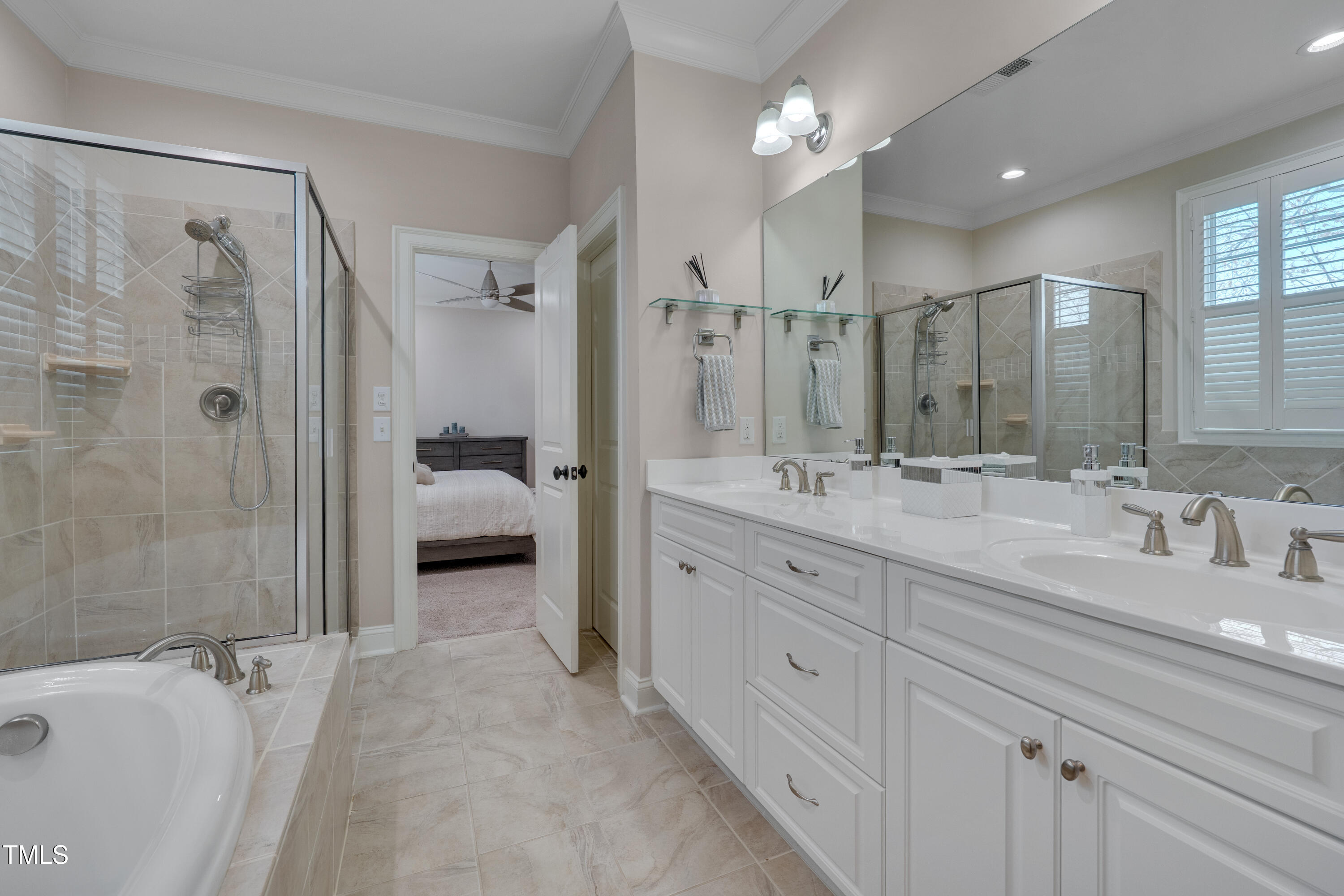 129 Cofield Circle Durham, NC 27707 - Photo 22 of 37 a spacious bathroom with a double vanity sink shower and a mirror