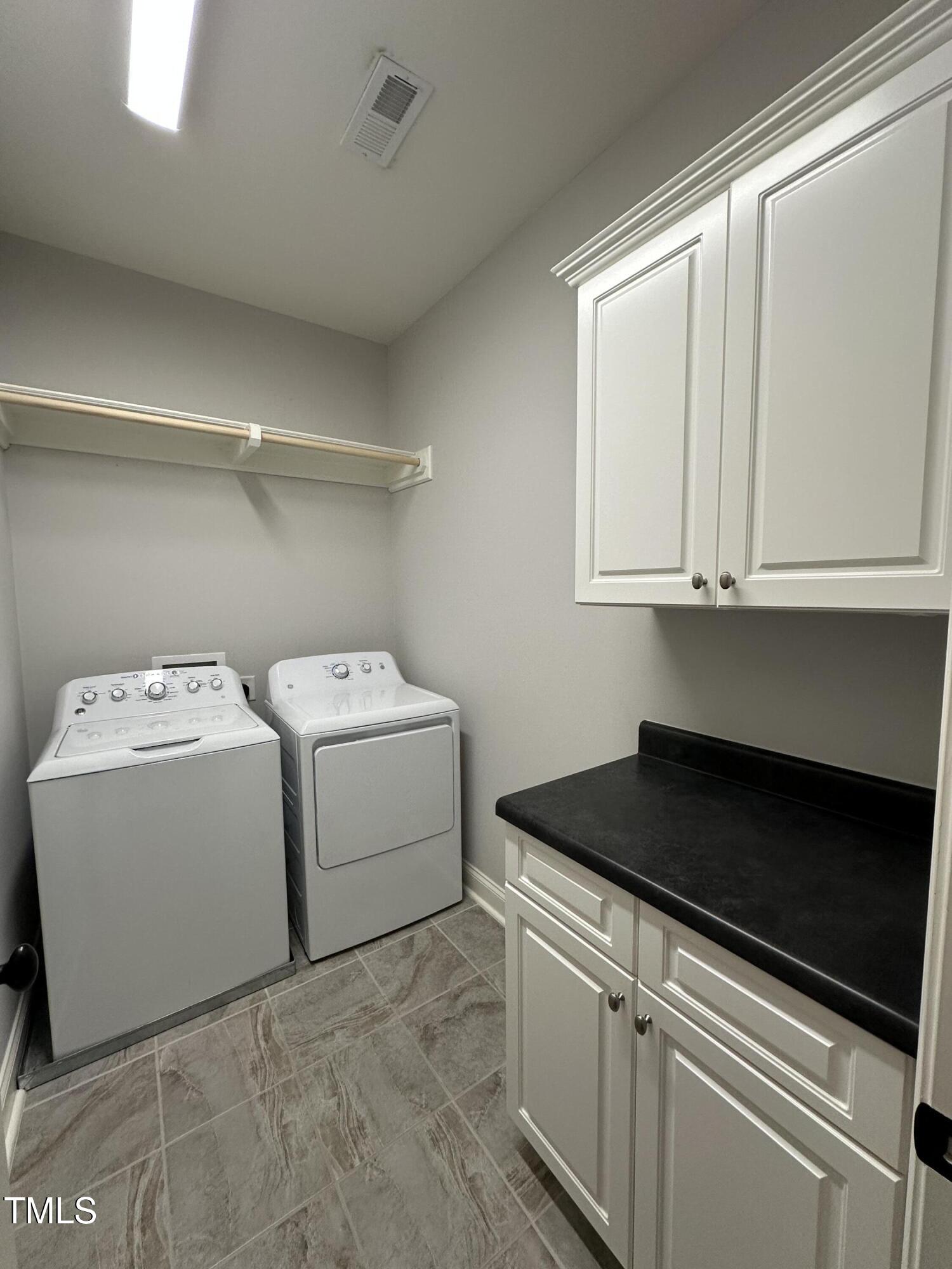 129 Cofield Circle Durham, NC 27707 - Photo 30 of 37 a utility room with dryer and washer
