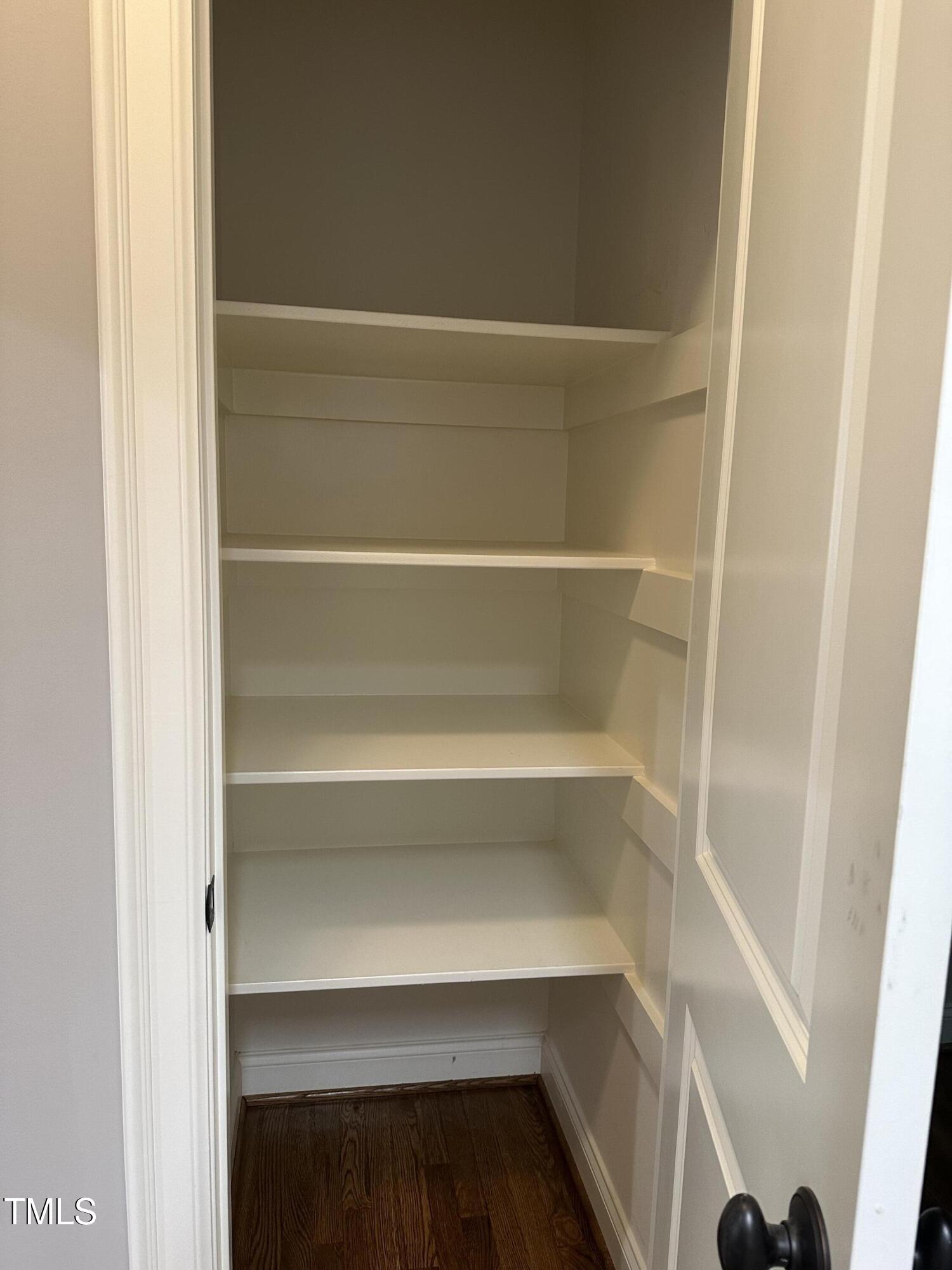 129 Cofield Circle Durham, NC 27707 - Photo 33 of 37 a view of walk in closet with empty racks