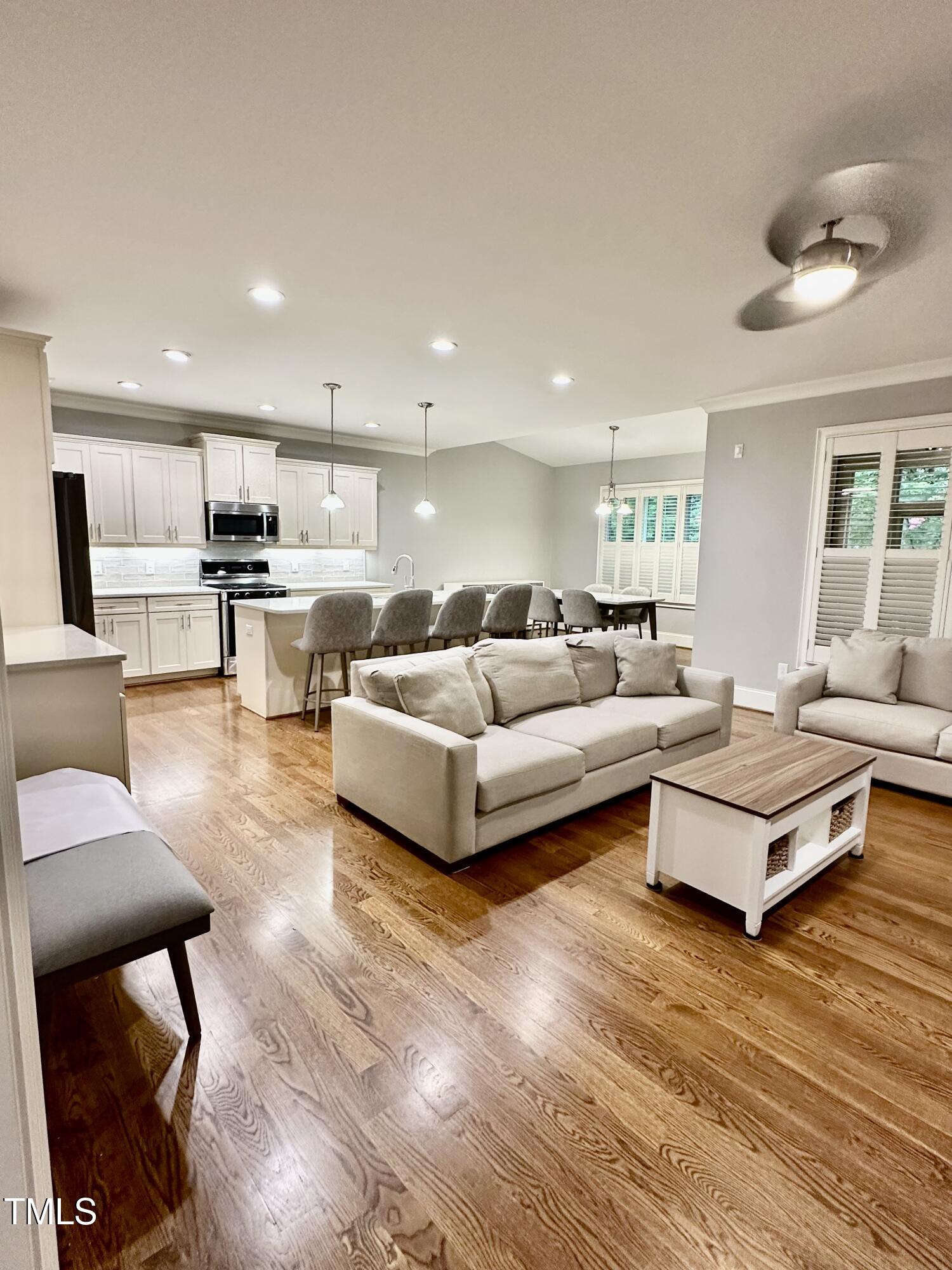 129 Cofield Circle Durham, NC 27707 - Photo 6 of 37 a living room with furniture and a wooden floor