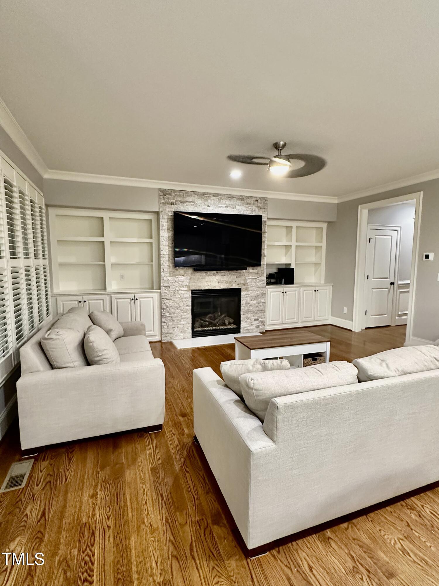 129 Cofield Circle Durham, NC 27707 - Photo 7 of 37 a living room with furniture and a fireplace