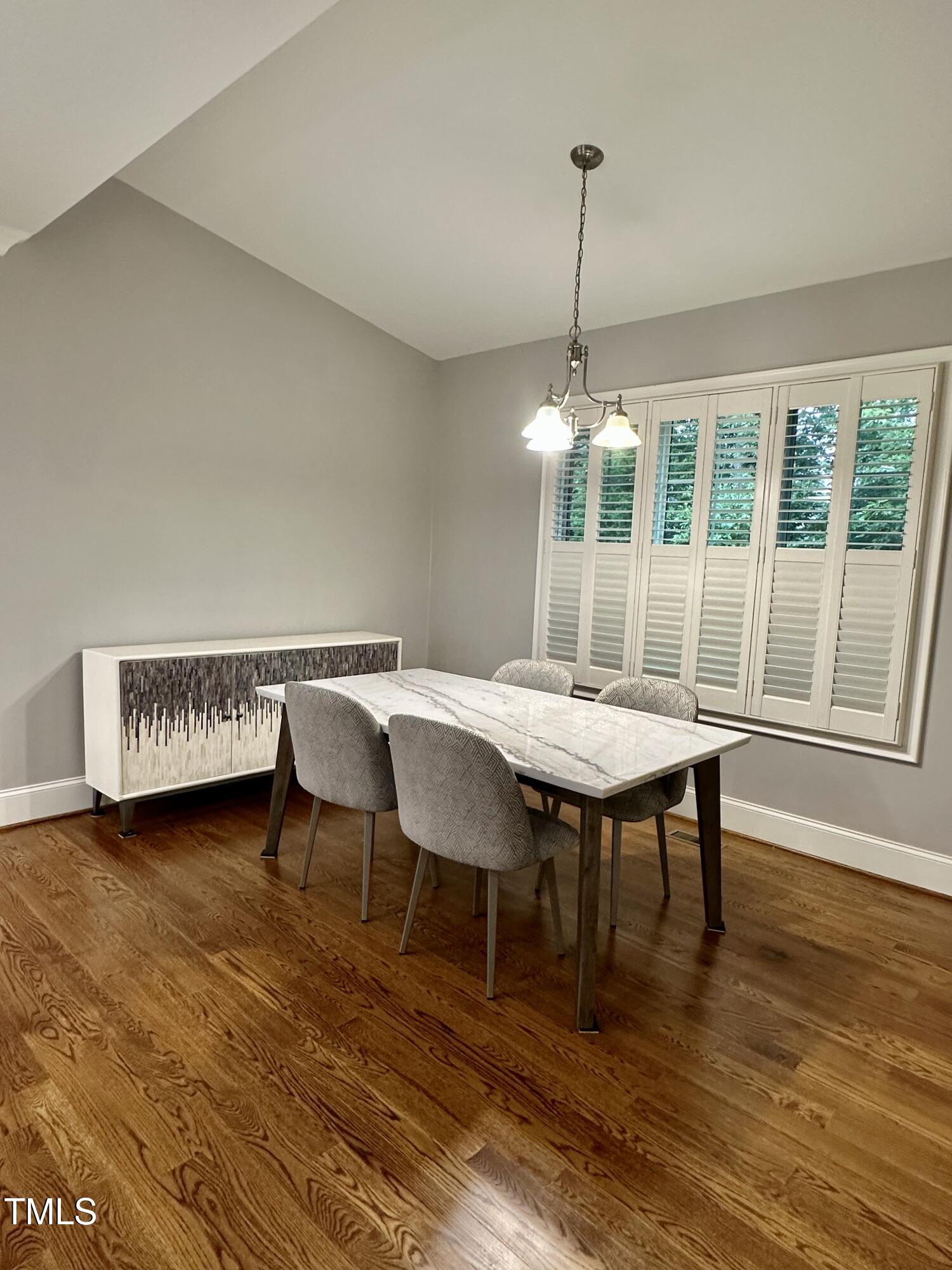 129 Cofield Circle Durham, NC 27707 - Photo 8 of 37 a view of a dining room with furniture window and wooden floor