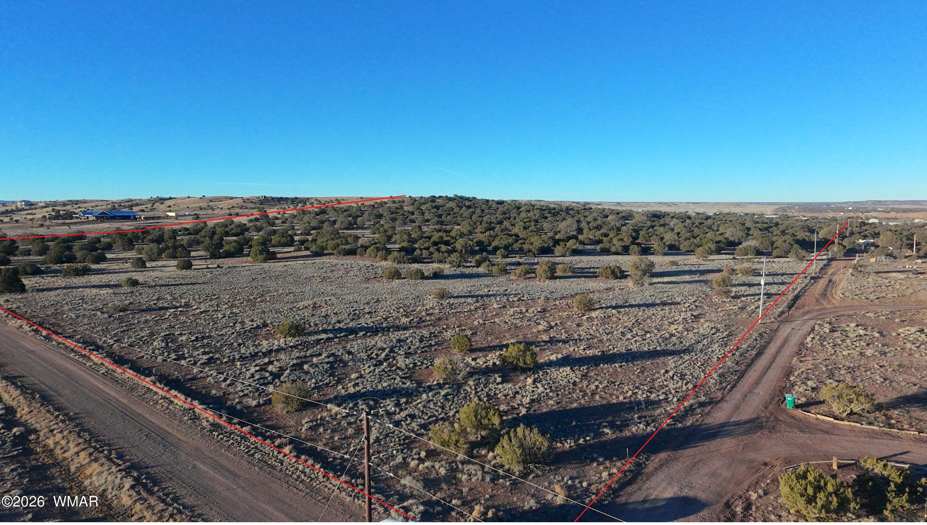 Tbd Arena Estates Taylor, AZ 85939 - Photo 2 of 15 a view of a dry yard with wooden fence