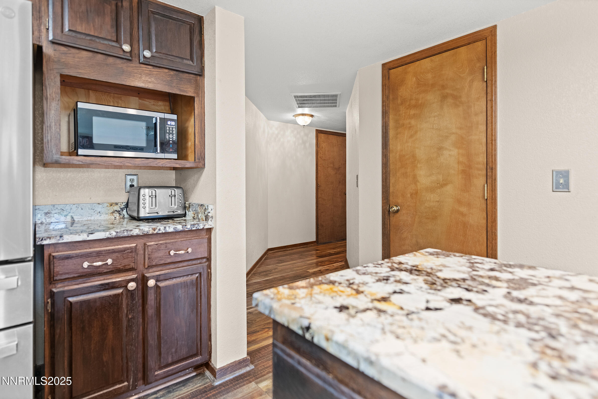 2780 Mario Road Reno, NV 89523 - Photo 13 of 41 a bedroom with a bed and a dresser in it