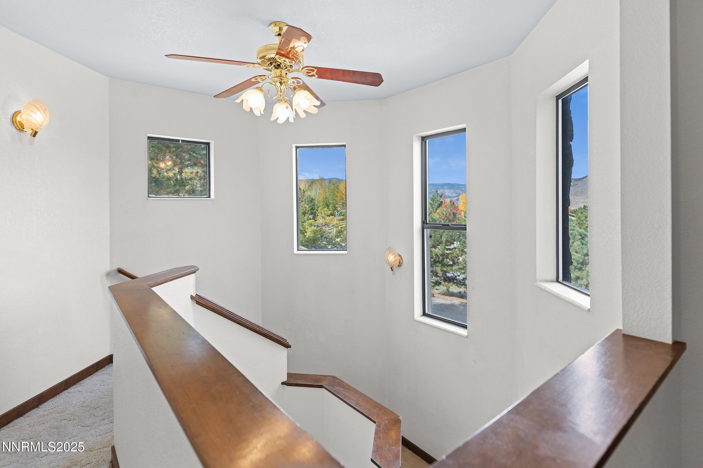 2780 Mario Road Reno, NV 89523 - Photo 19 of 41 a view of a hallway with windows