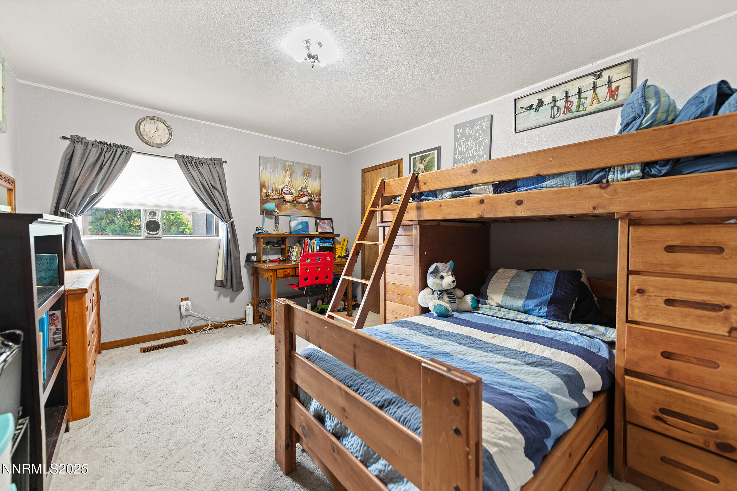 2780 Mario Road Reno, NV 89523 - Photo 27 of 41 a bedroom with bed and a window