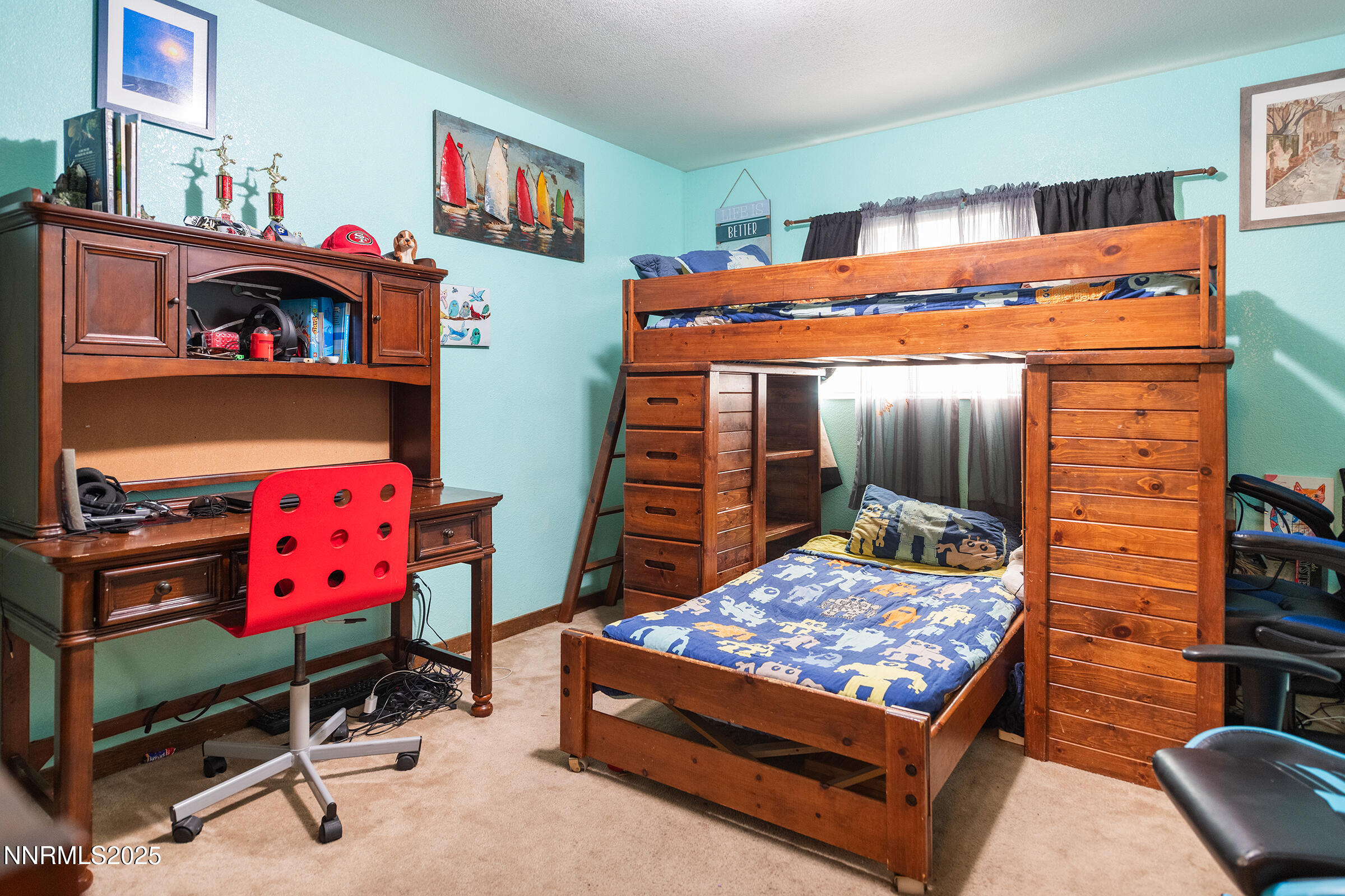 2780 Mario Road Reno, NV 89523 - Photo 29 of 41 a bedroom with a bed and wooden floor