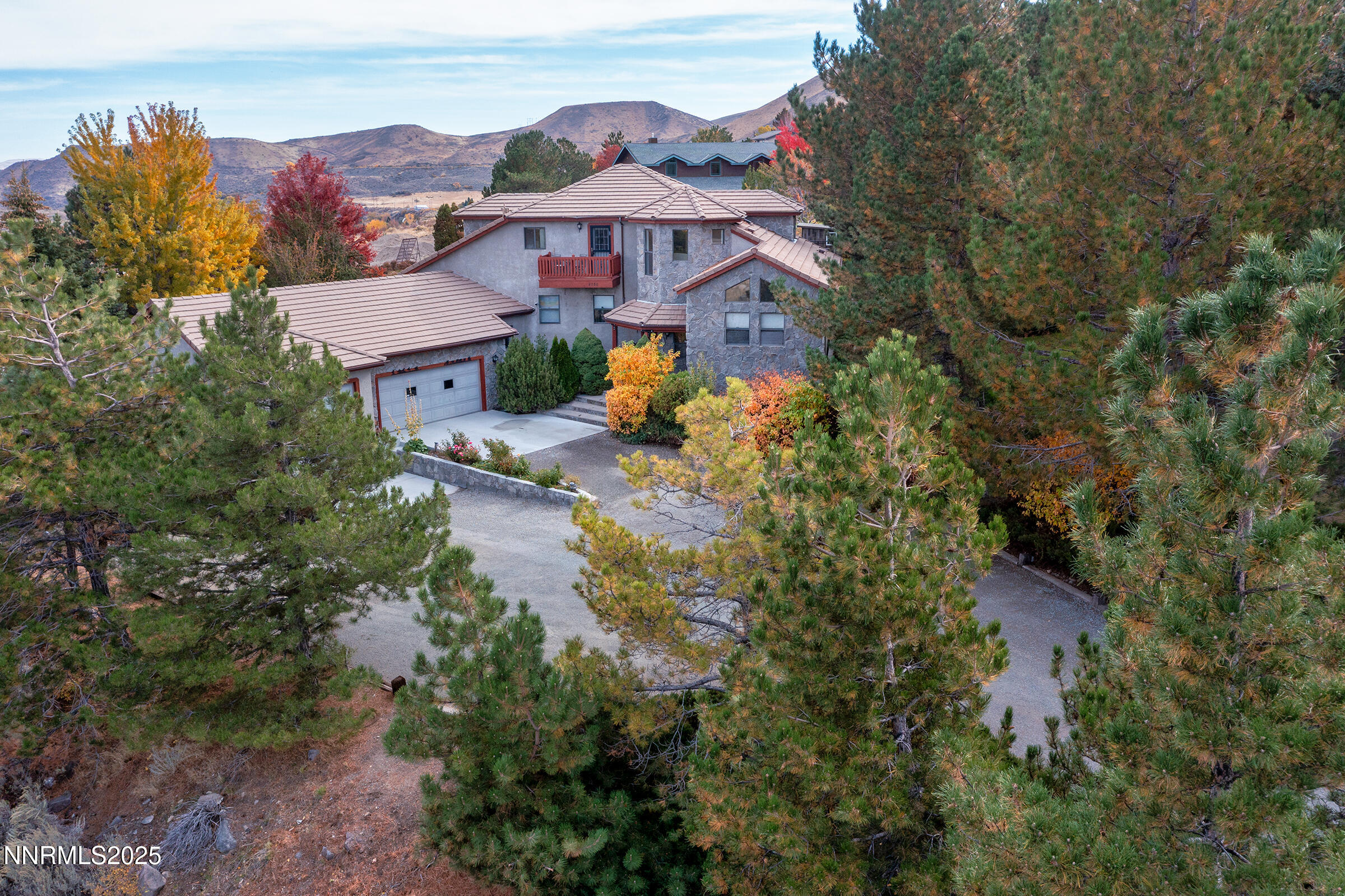 2780 Mario Road Reno, NV 89523 - Photo 33 of 41 an aerial view of residential houses with outdoor space and trees