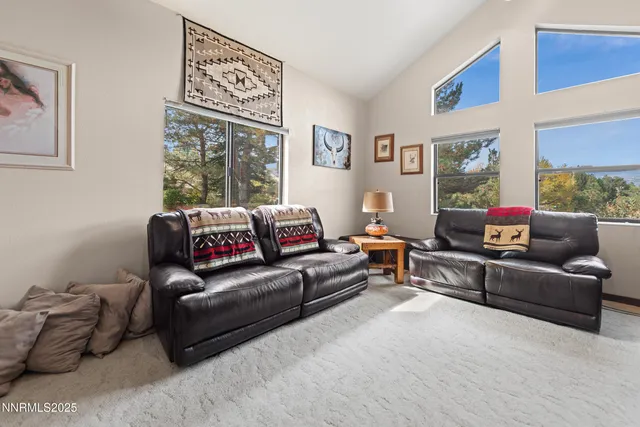 a bathroom with a granite countertop sink a shower and a mirror