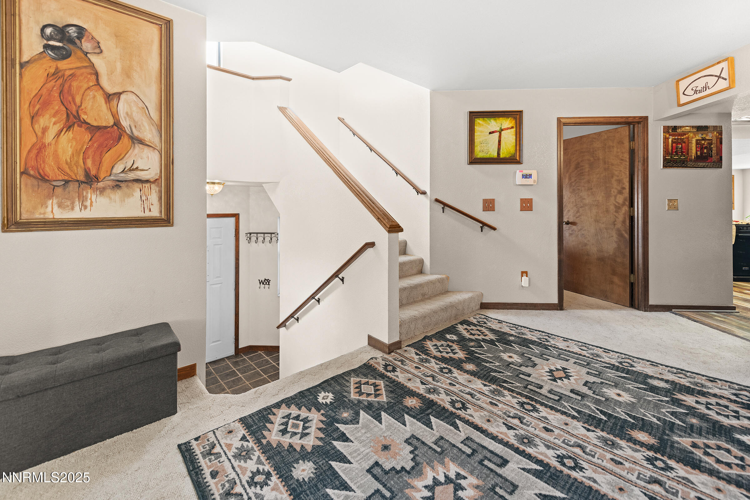 2780 Mario Road Reno, NV 89523 - Photo 9 of 41 a view of a livingroom with wooden floor and stairs