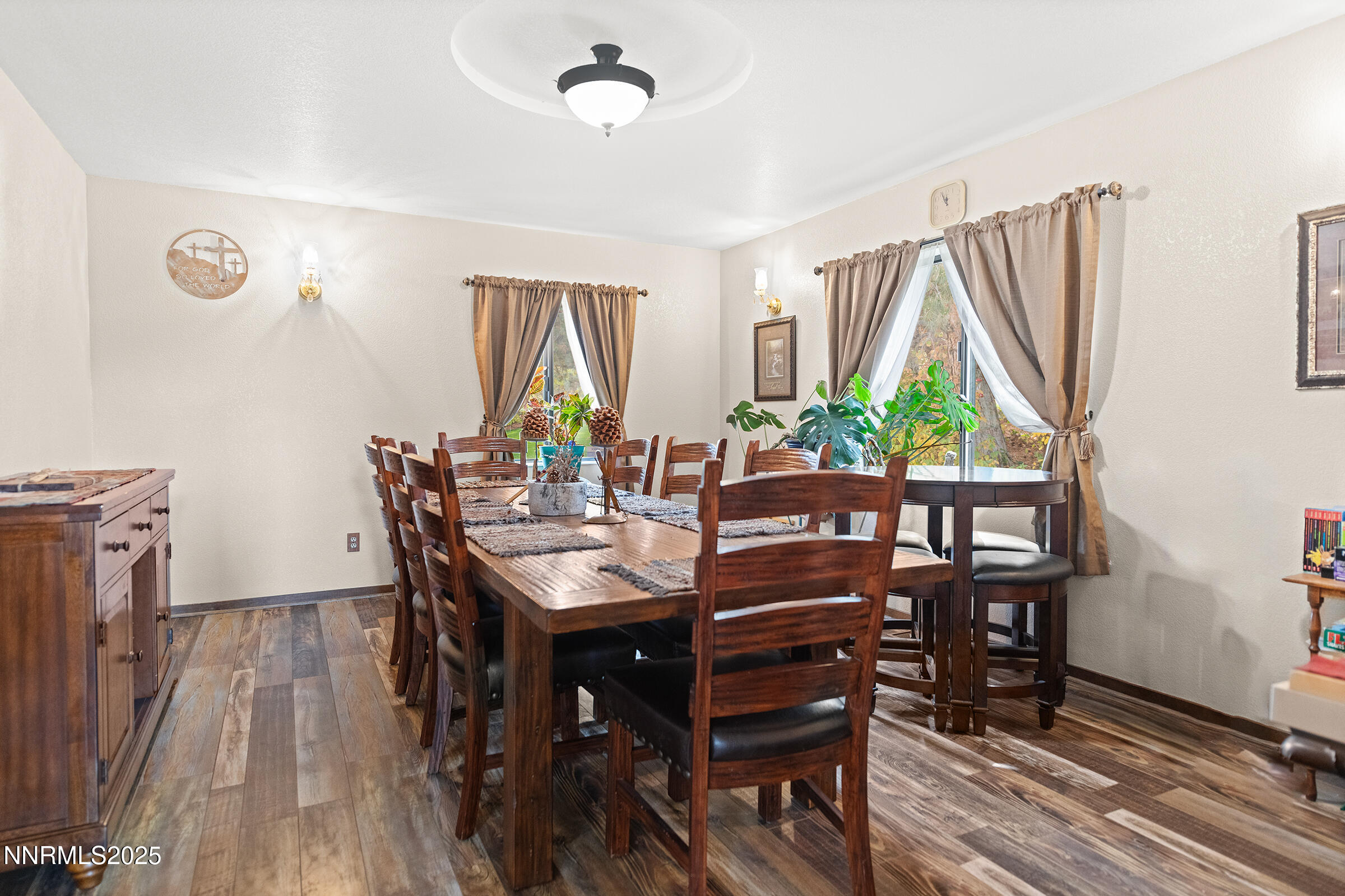 2780 Mario Road Reno, NV 89523 - Photo 10 of 41 a view of a dining room with furniture window and wooden floor