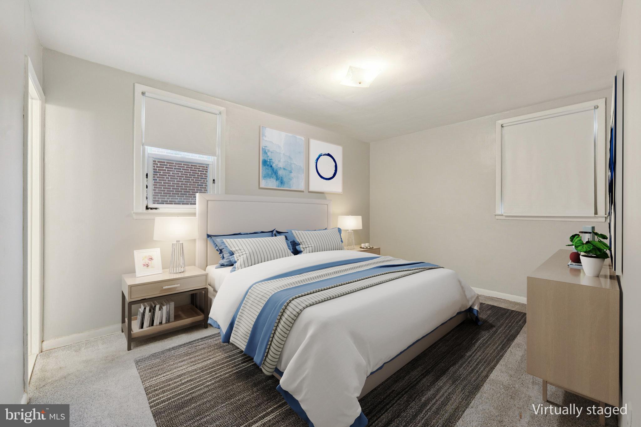 2311 Afton Street Philadelphia, PA 19152 - Photo 11 of 28 a bedroom with a bed and a couch