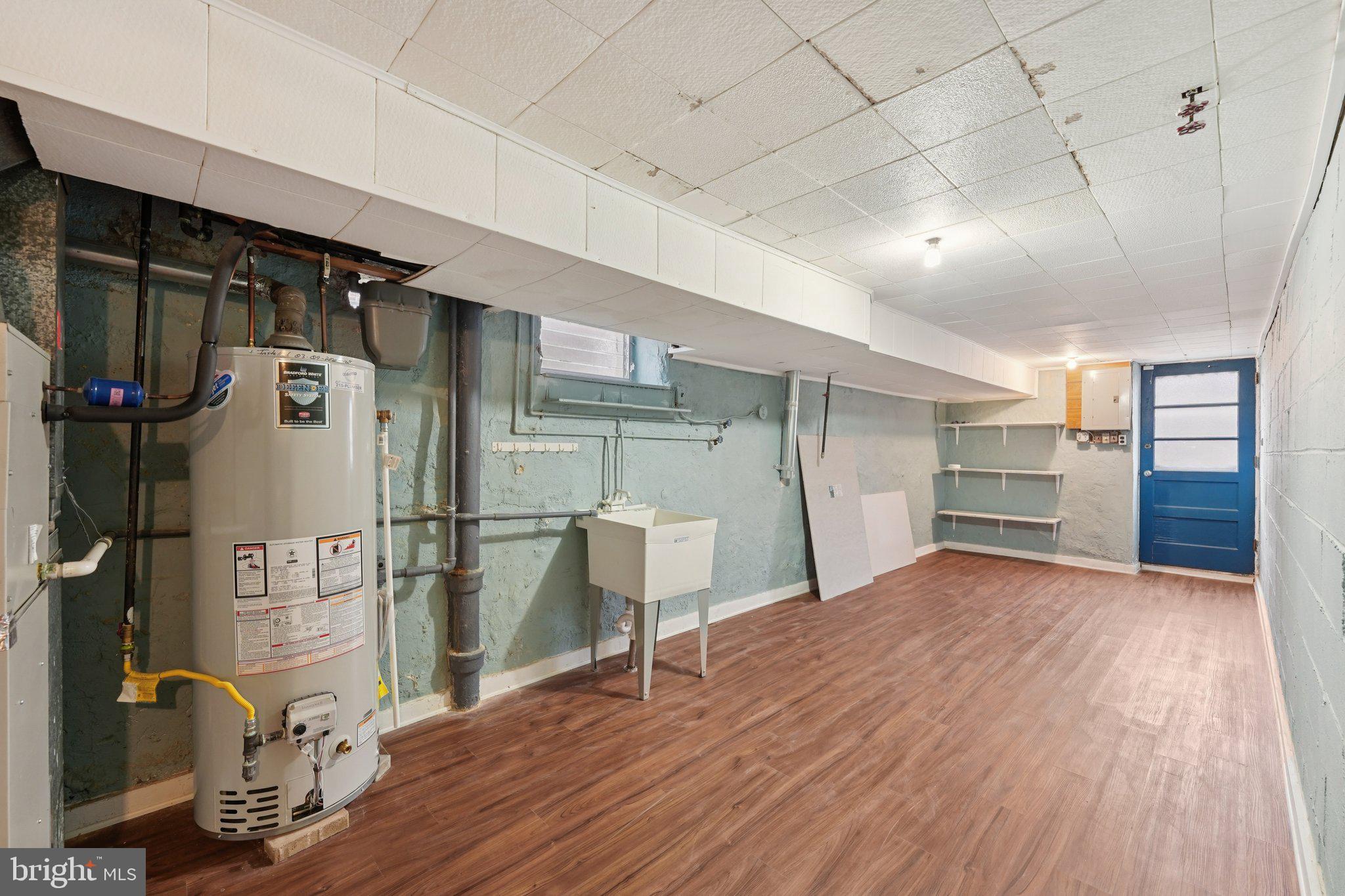 2311 Afton Street Philadelphia, PA 19152 - Photo 24 of 28 a view of a room with wooden floor and electronic appliances