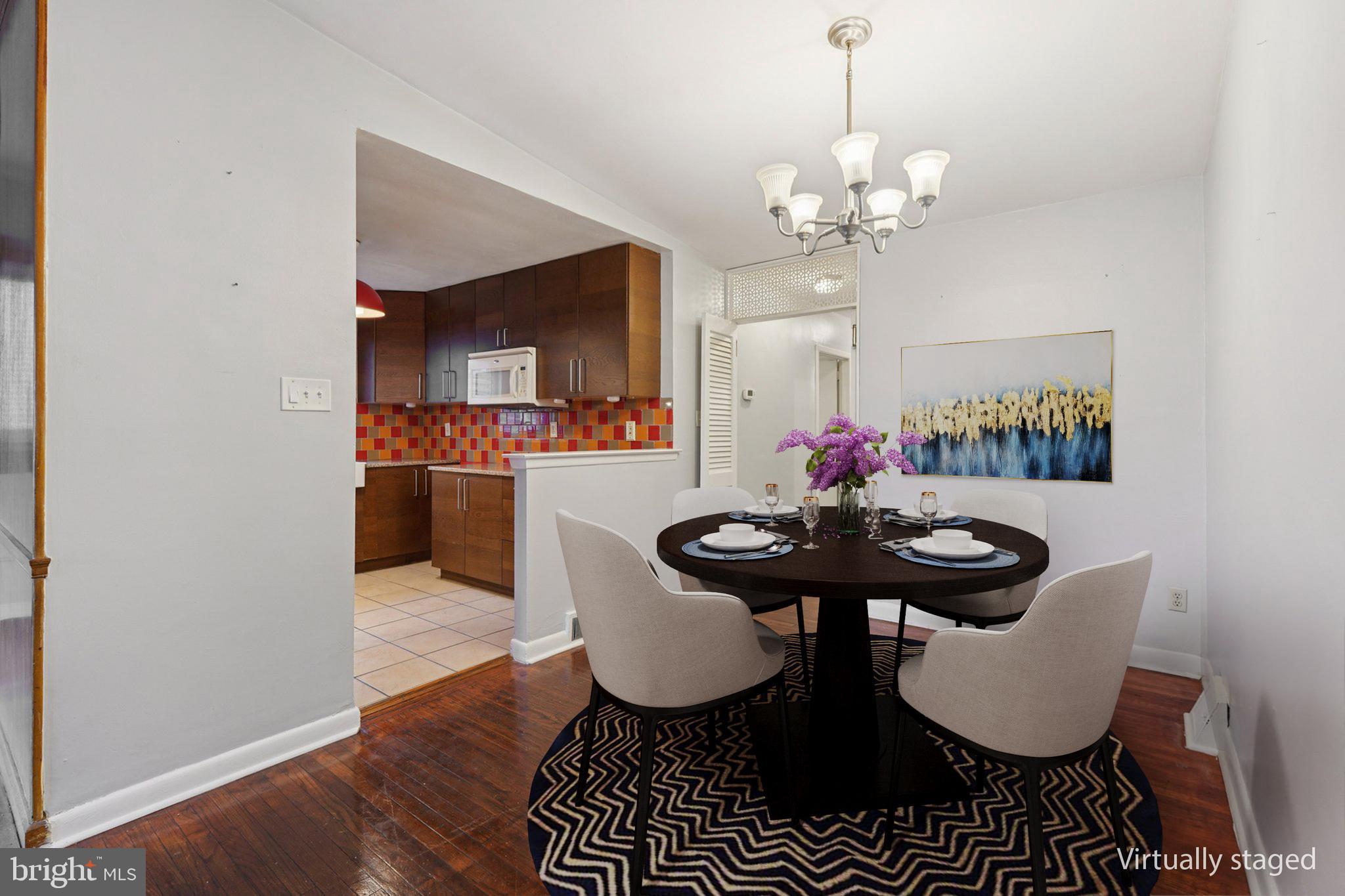 2311 Afton Street Philadelphia, PA 19152 - Photo 6 of 28 a view of a dining room with furniture and wooden floor