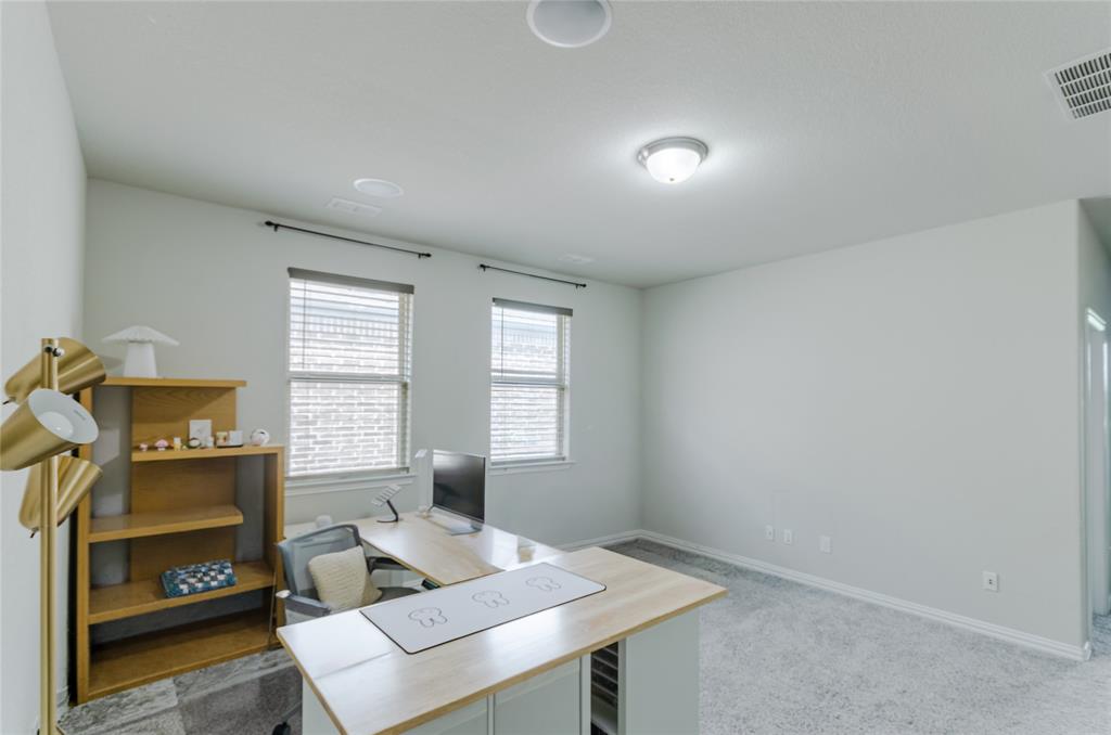 1448 Pebble Way Allen, TX 75013 - Photo 9 of 25 a workspace with furniture and a window
