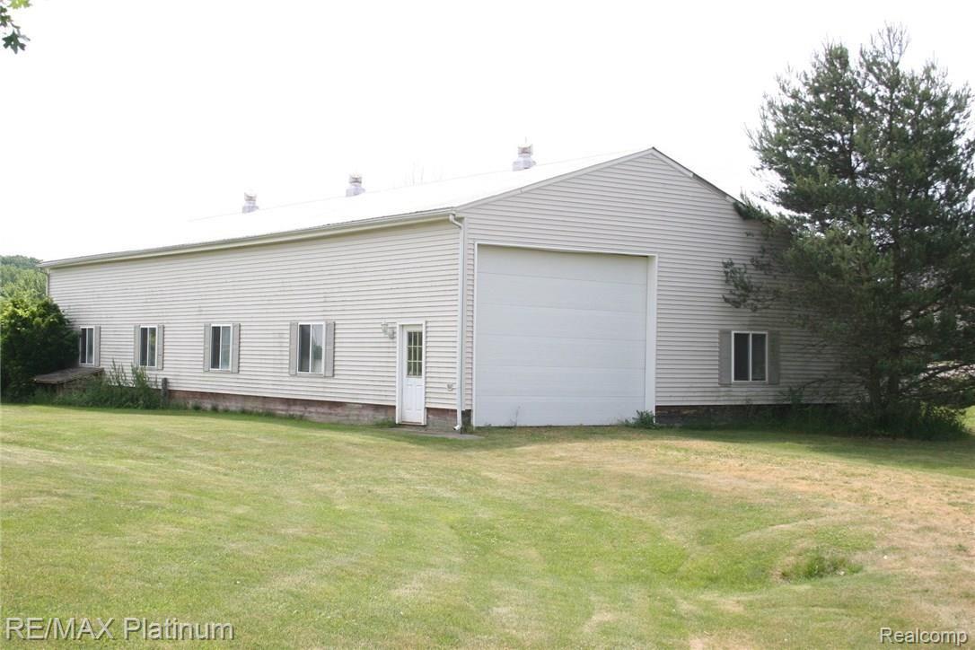 4250 Crandall Road Howell, MI 48855 - Photo 9 of 57 Barn has this 16' wide x 12' high overhead door at this end