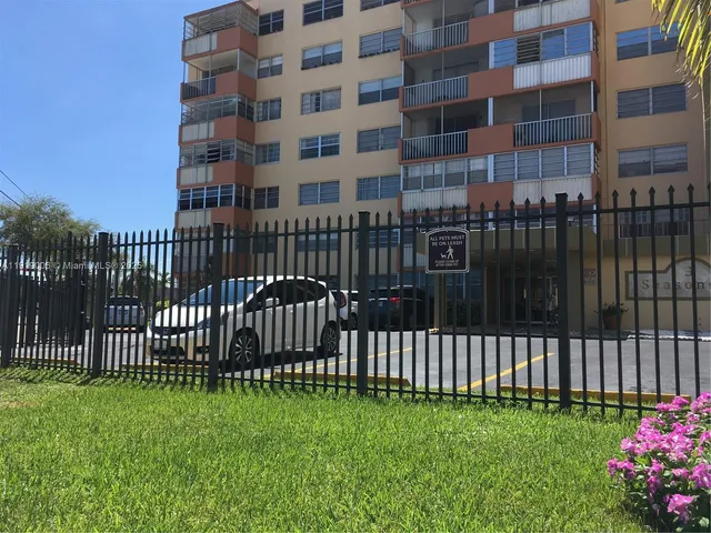 a view of a building with a garden