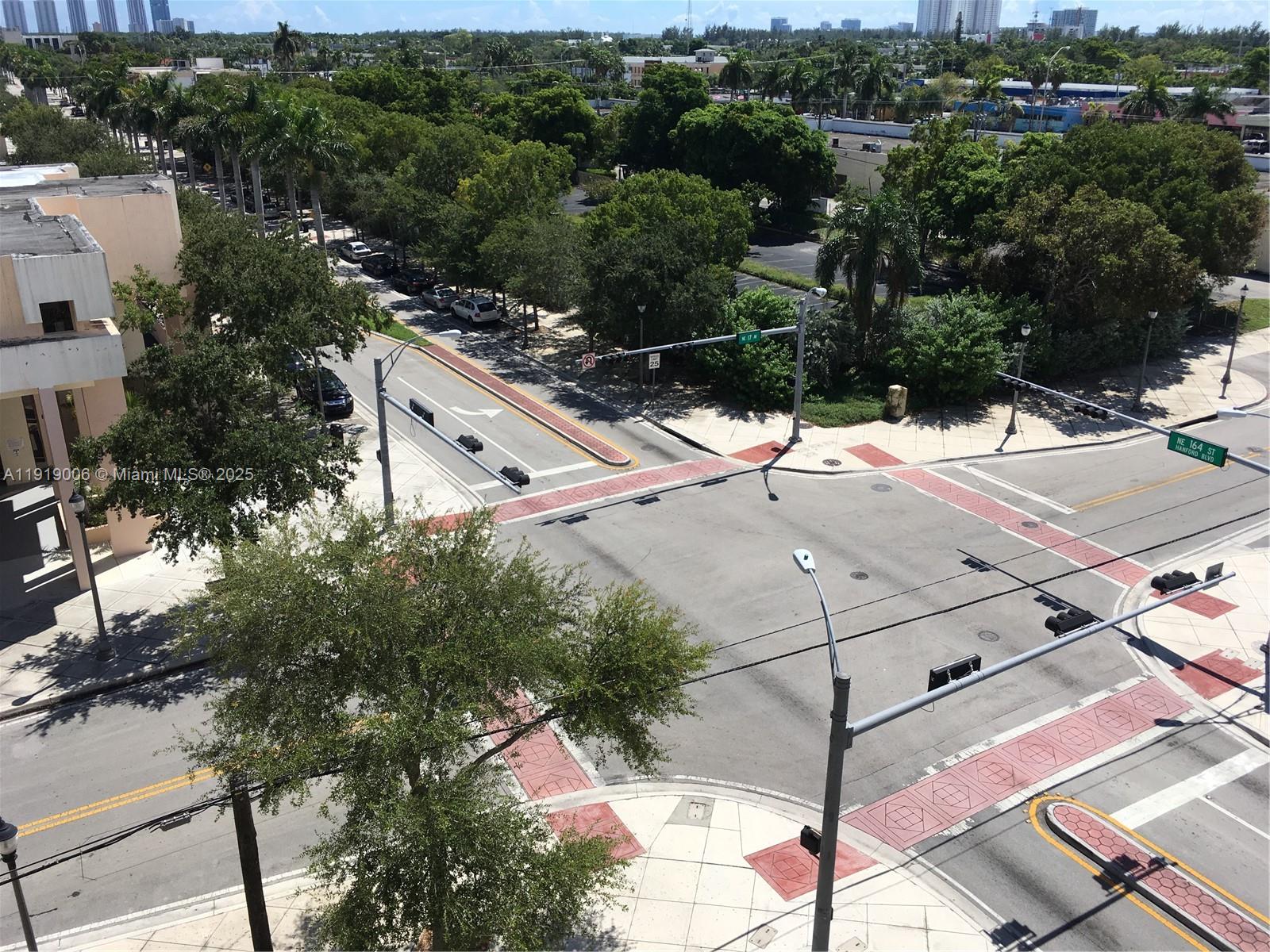 16400 Northeast 17th Avenue, Unit 3042 North Miami Beach, FL 33162 - Photo 17 of 17 a aerial view of a house with a yard
