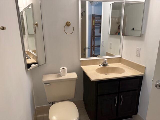 8294 Boca Rio Drive Boca Raton, FL 33433 - Photo 12 of 18 a bathroom with a sink and a toilet